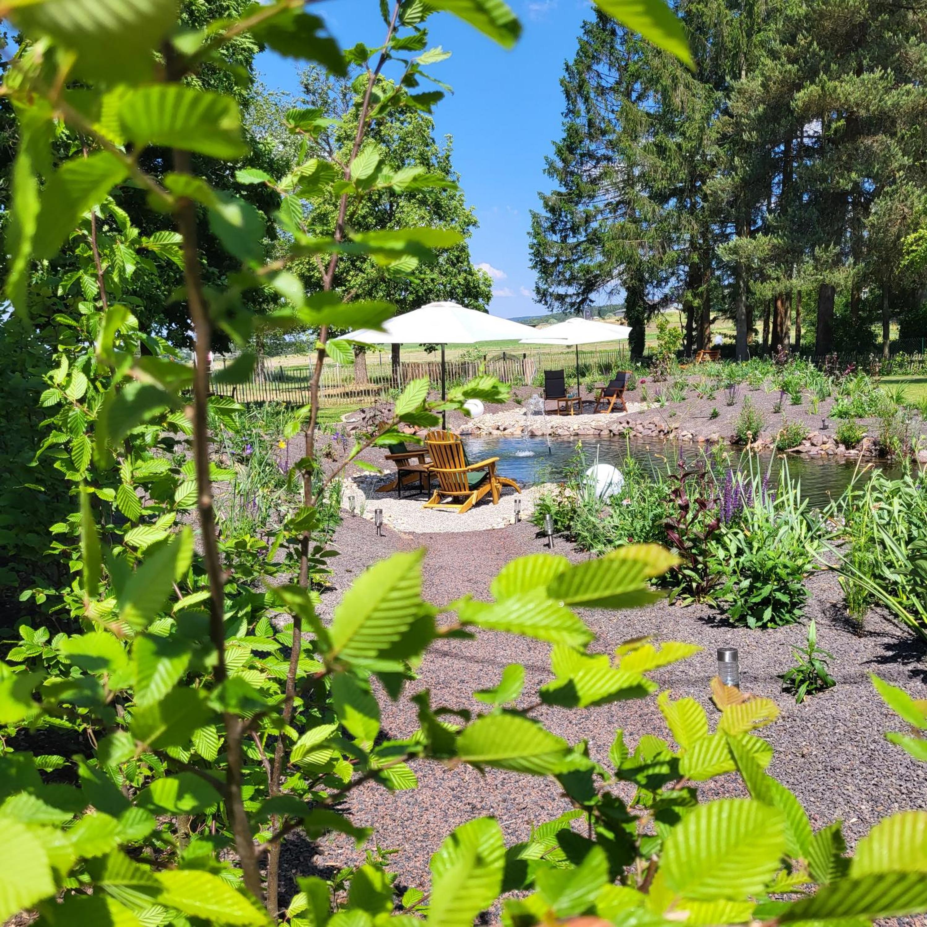 Komfort Ferienwohnungen mit Wellness-Garten - Gästehaus am Bachlauf - Losheim am See