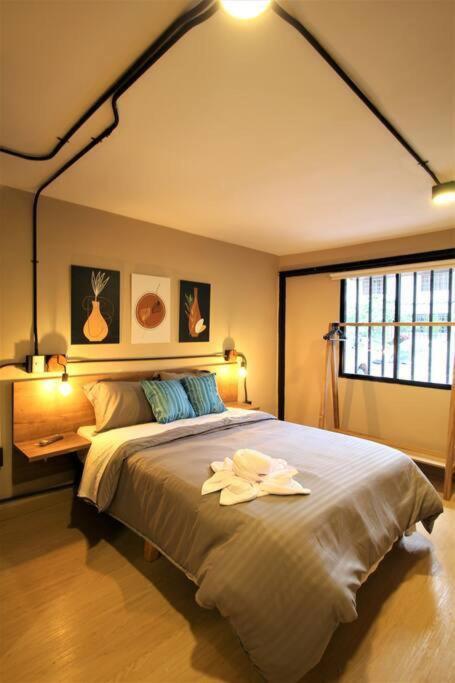 Alojamiento en Laureles Medellín con cocina y baño privado - ONE106 By Roots Rentals