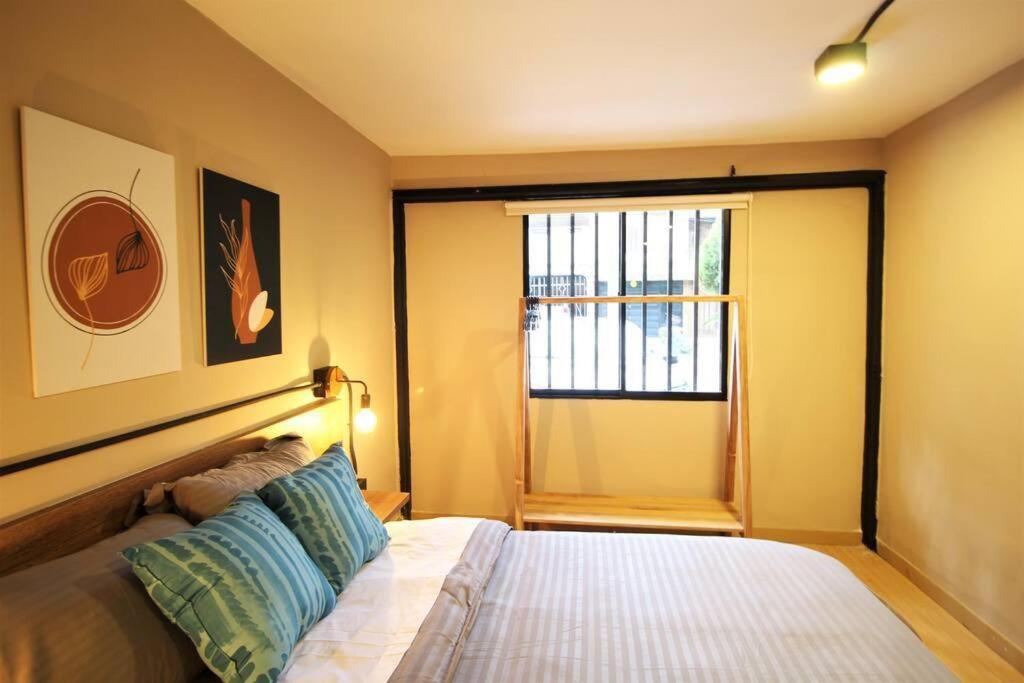 Alojamiento en Laureles Medellín con cocina y baño privado - ONE106 By Roots Rentals