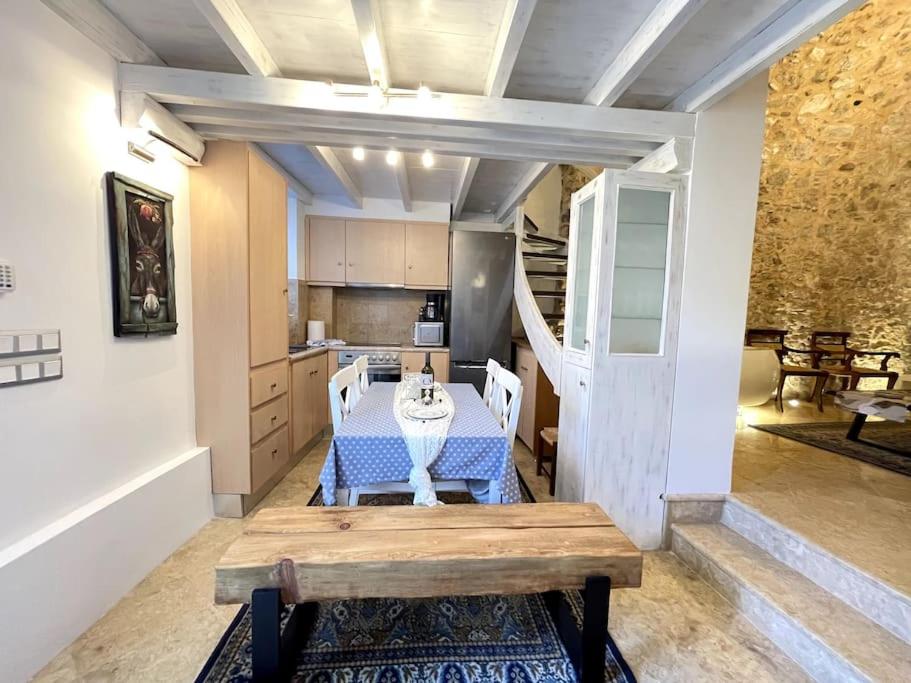 LIVING IN A CAVE UNDER ACROPOLIS