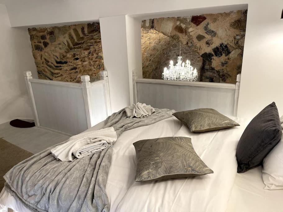 LIVING IN A CAVE UNDER ACROPOLIS