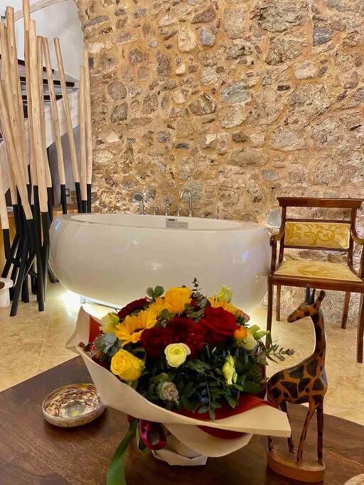 LIVING IN A CAVE UNDER ACROPOLIS