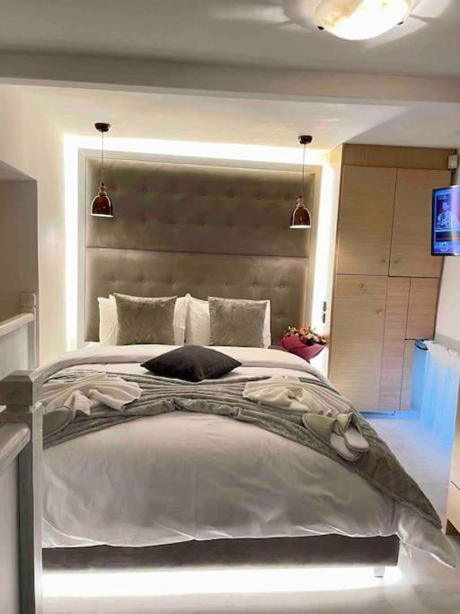 LIVING IN A CAVE UNDER ACROPOLIS