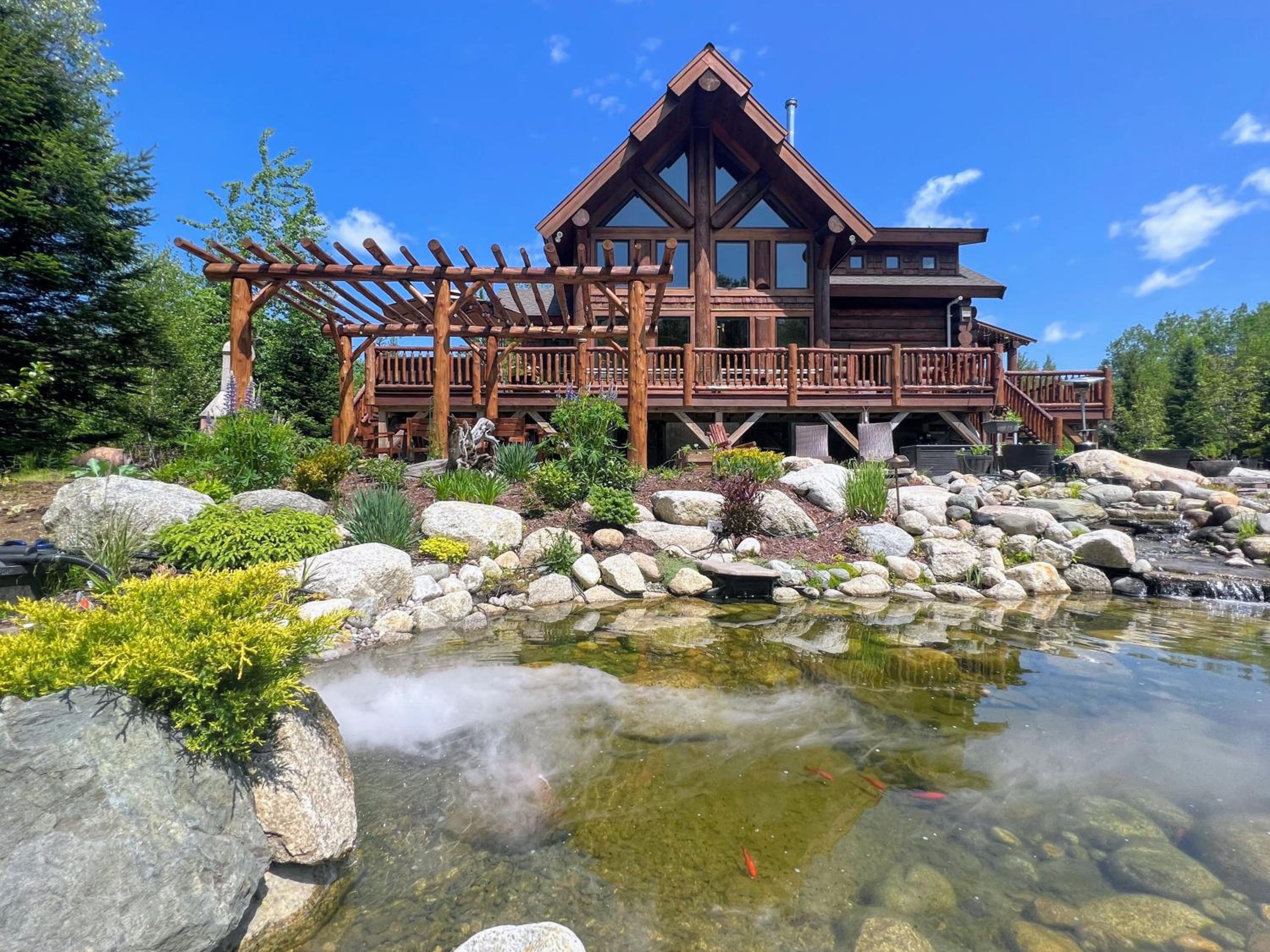 WML stunning log home in Bretton Woods, AC, 2-person Jacuzzi, indoor and outdoor fireplaces, & more! view 4