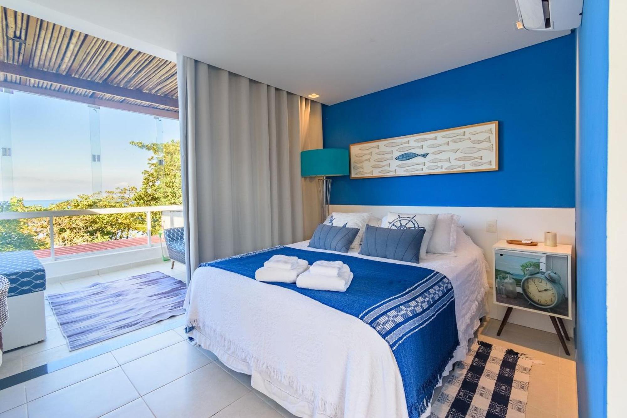 Casa com piscina em frente à Praia de Camburi