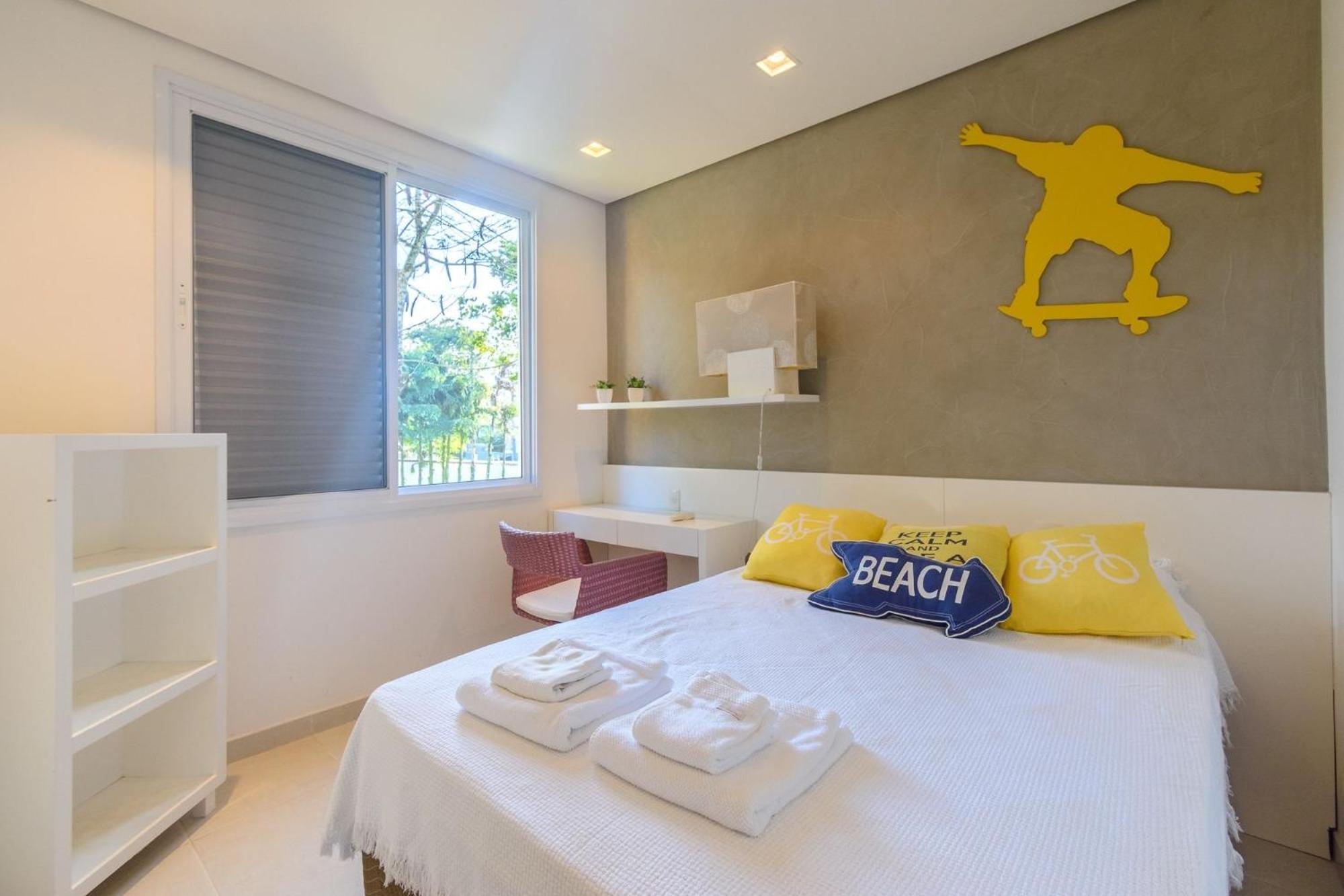 Casa com piscina em frente à Praia de Camburi
