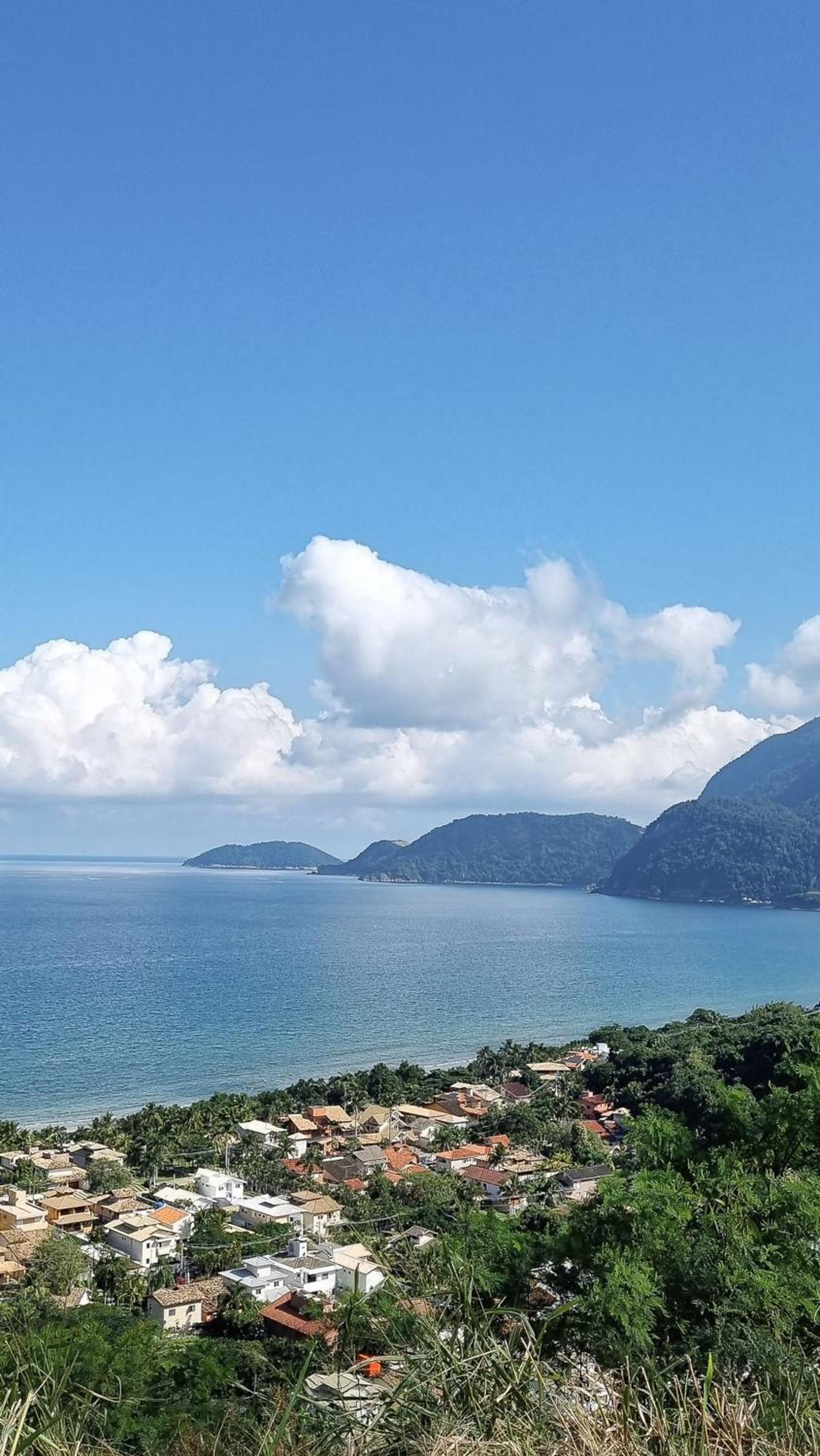 Casa com piscina em frente à Praia de Camburi