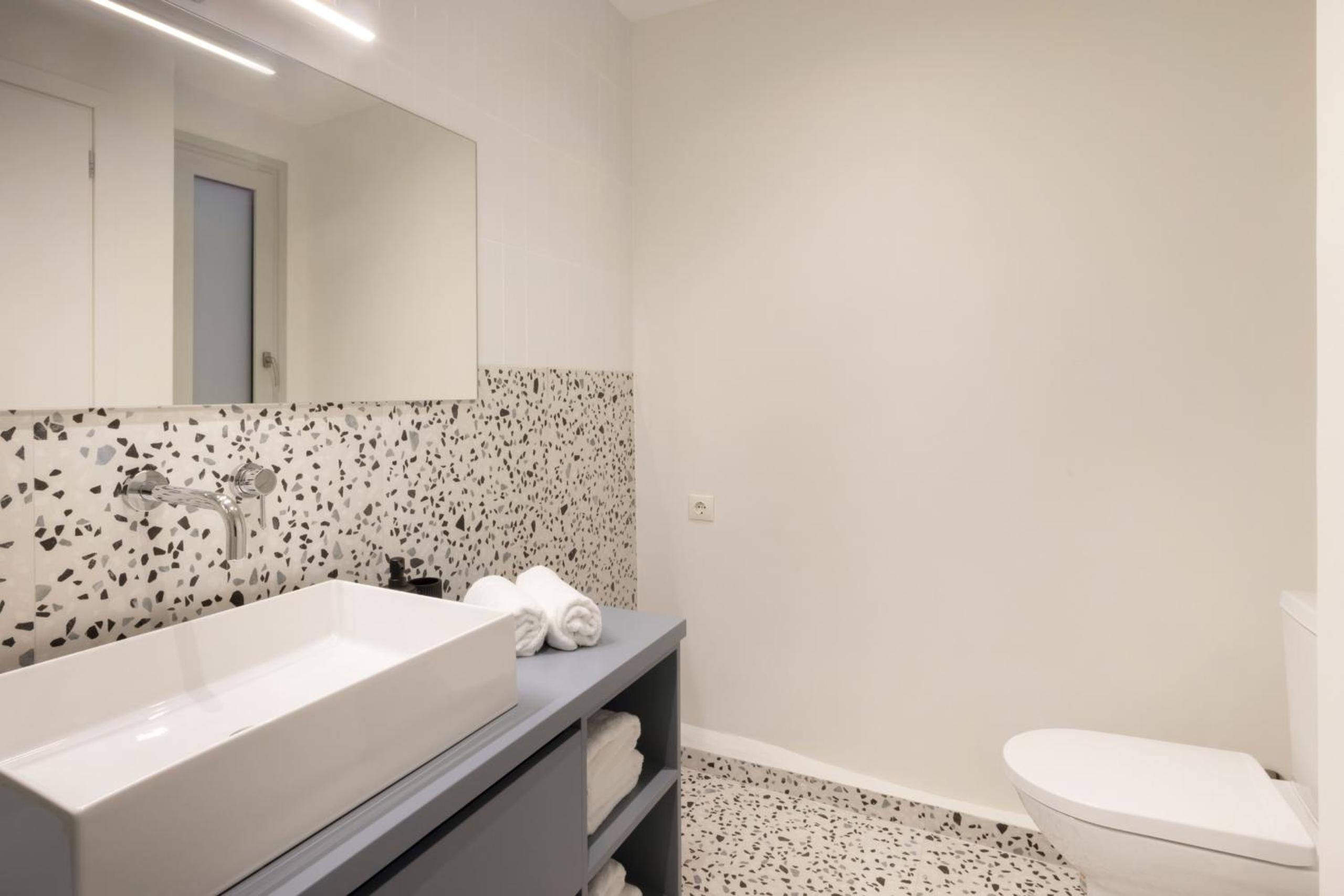 Versi2- Stylish 1BR pays homage to timeless charm