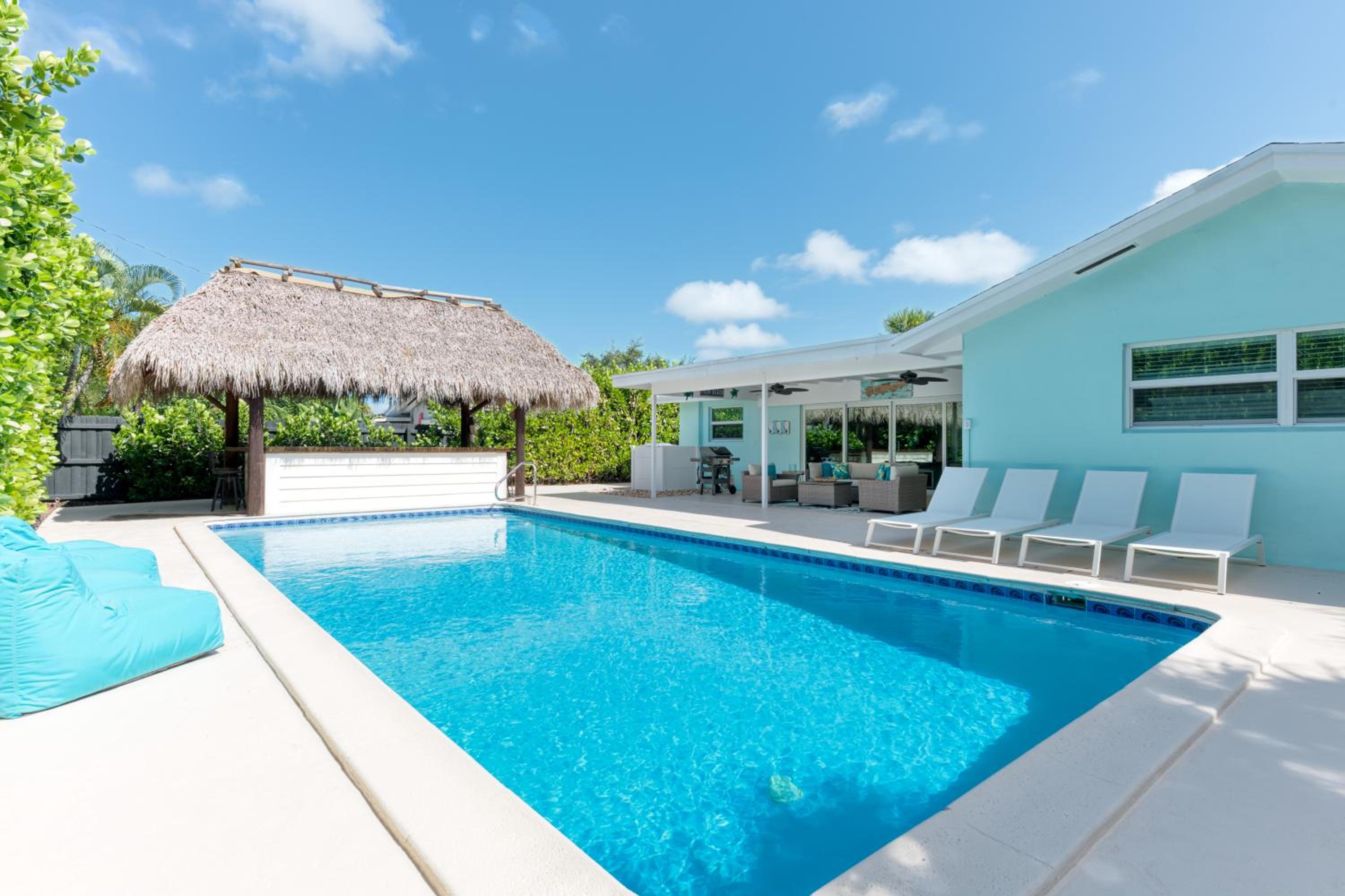 West Palm Beach Vacations - Tropical Villa Pool Home w/ Tiki Bar! Sleeps 9! - Property Image 1