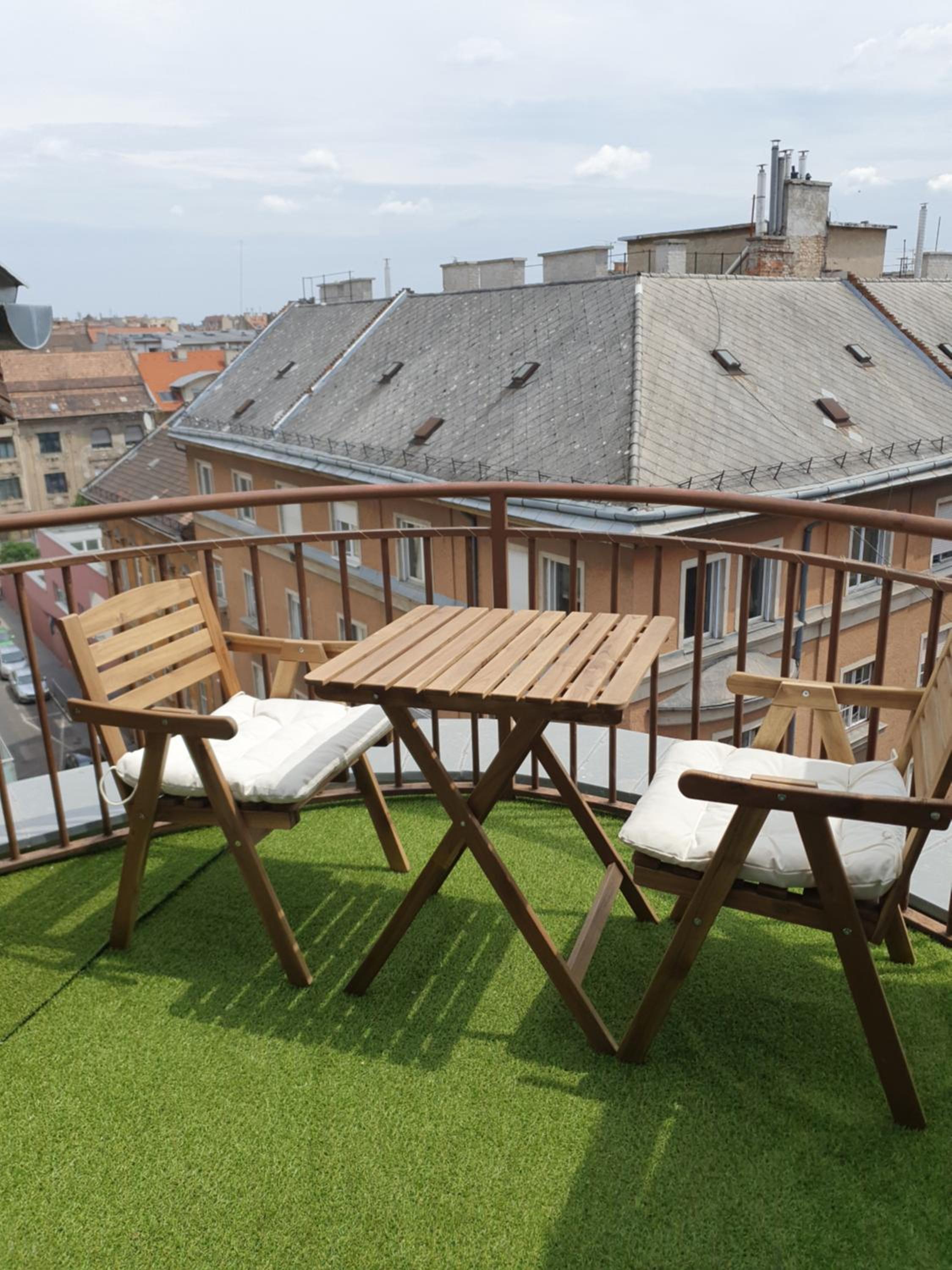 Modern top floor loft with balcony view 4