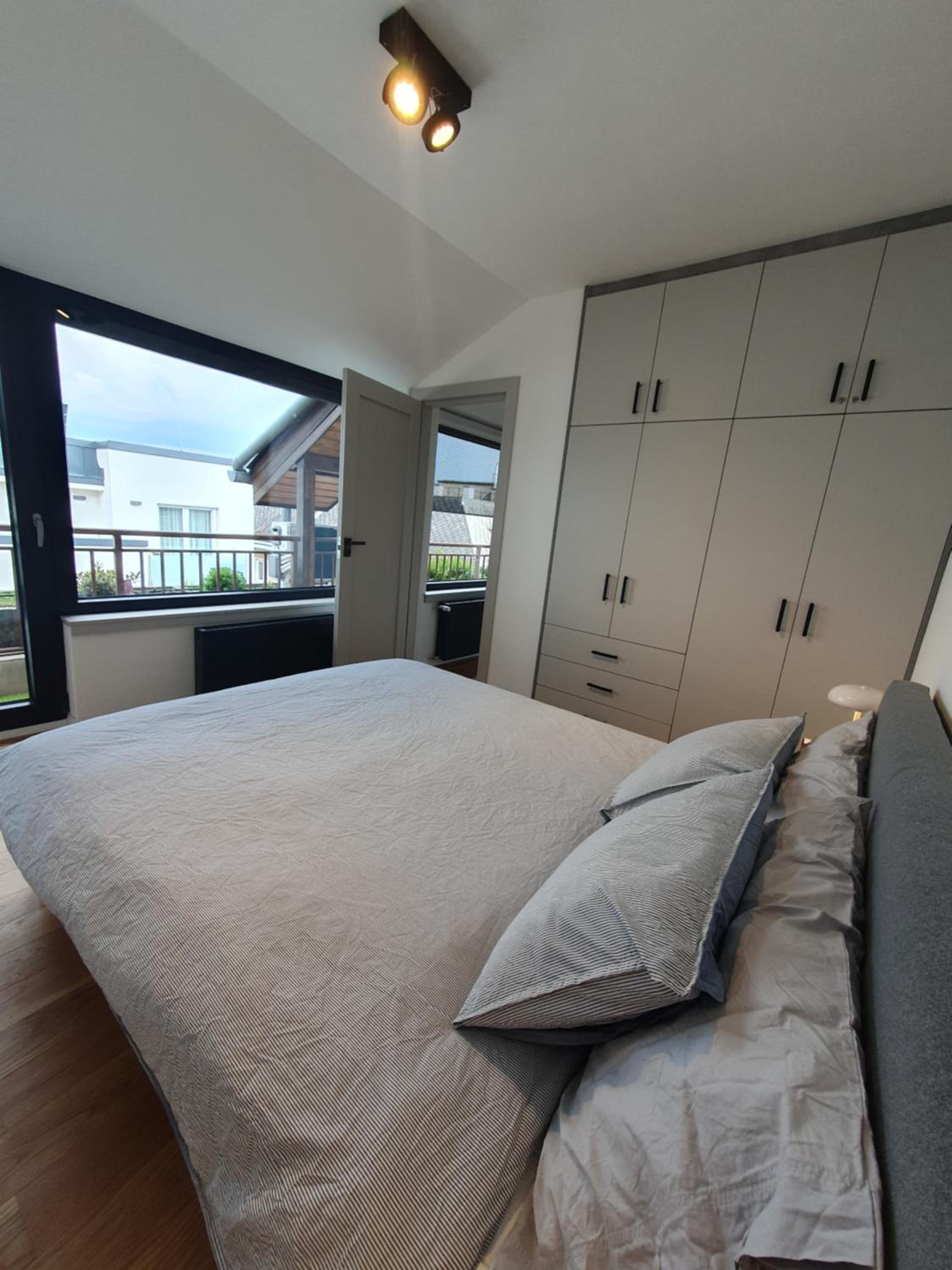 Modern top floor loft with balcony view 3