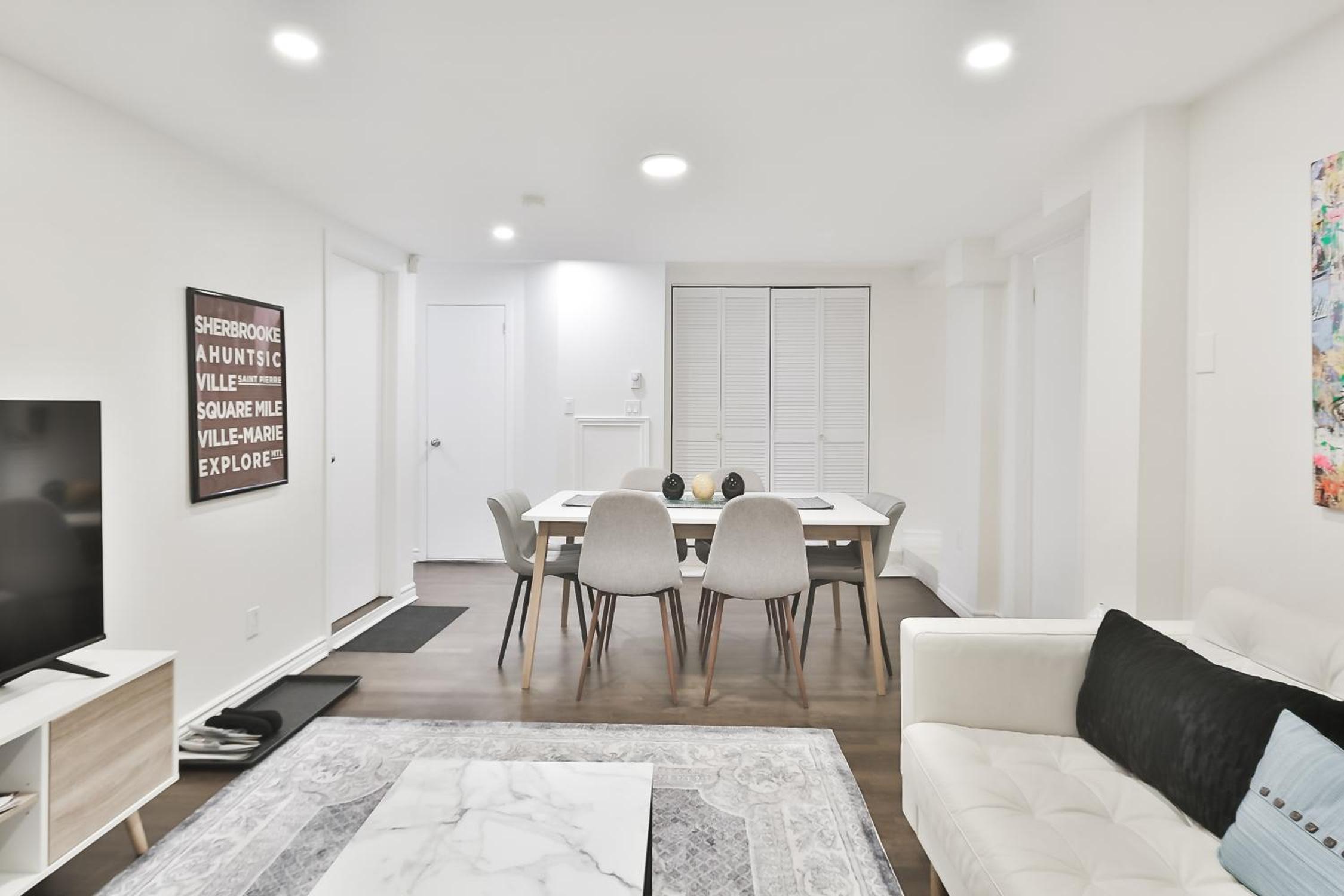 250 METERS to METRO BERRI UQAM - Spacious fully equipped APARTMENTS - 1 FREE PARKING per unit - in-unit Washer & Dryer - fully stocked KITCHEN - WORKSPACE 
