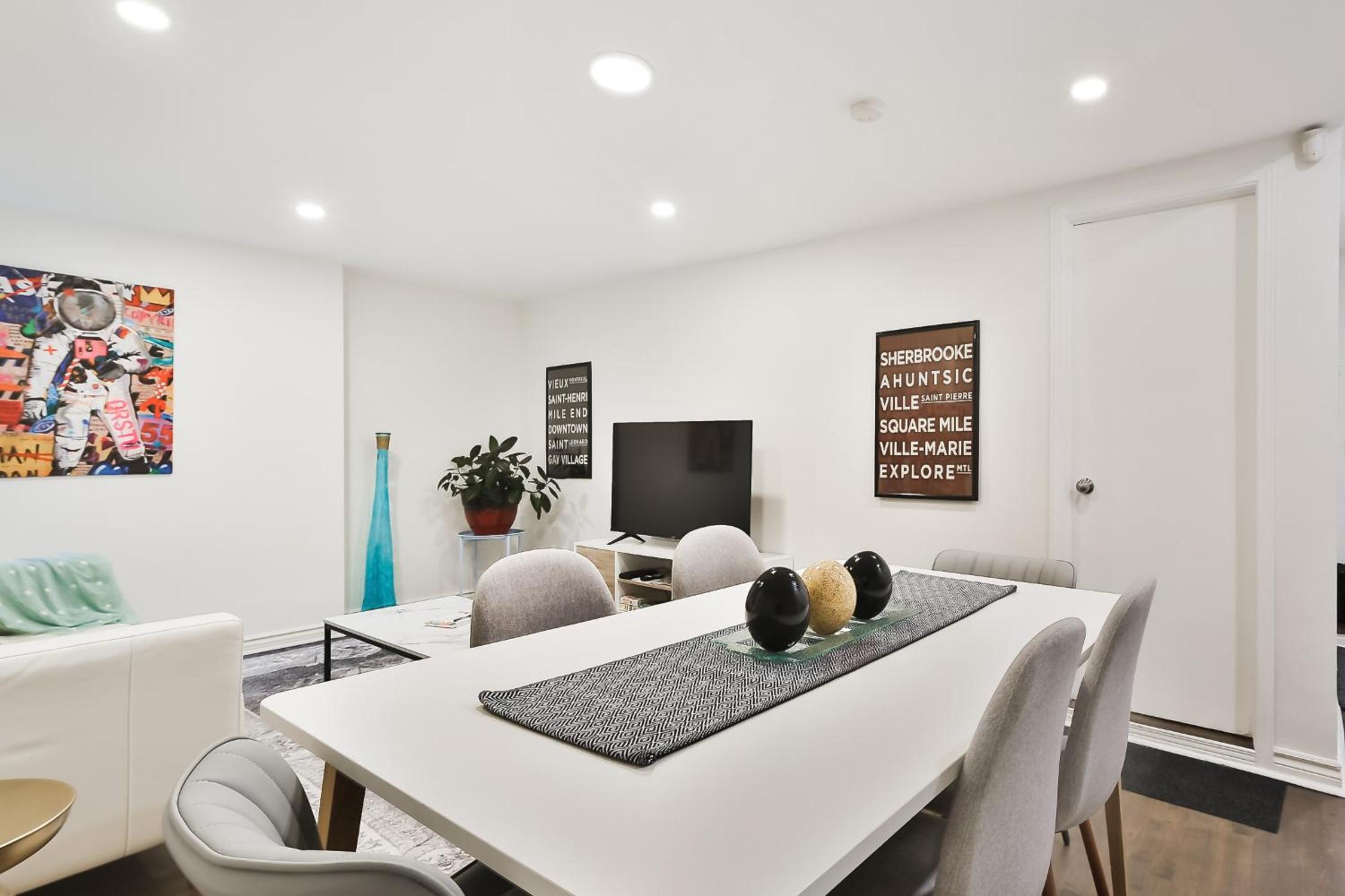 250 METERS to METRO BERRI UQAM - Spacious fully equipped APARTMENTS - 1 FREE PARKING per unit - in-unit Washer & Dryer - fully stocked KITCHEN - WORKSPACE 