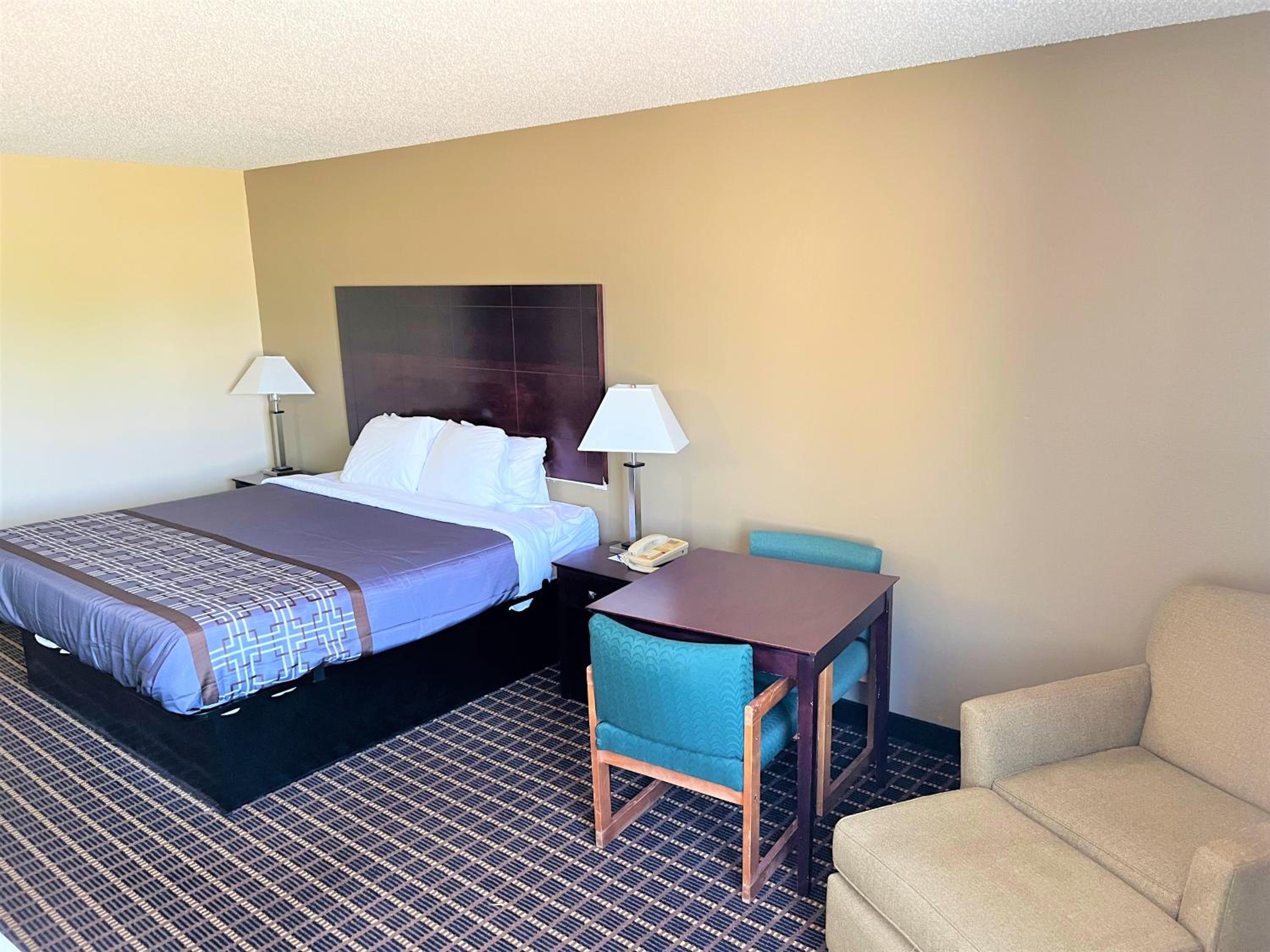 Designer Inn and Suites