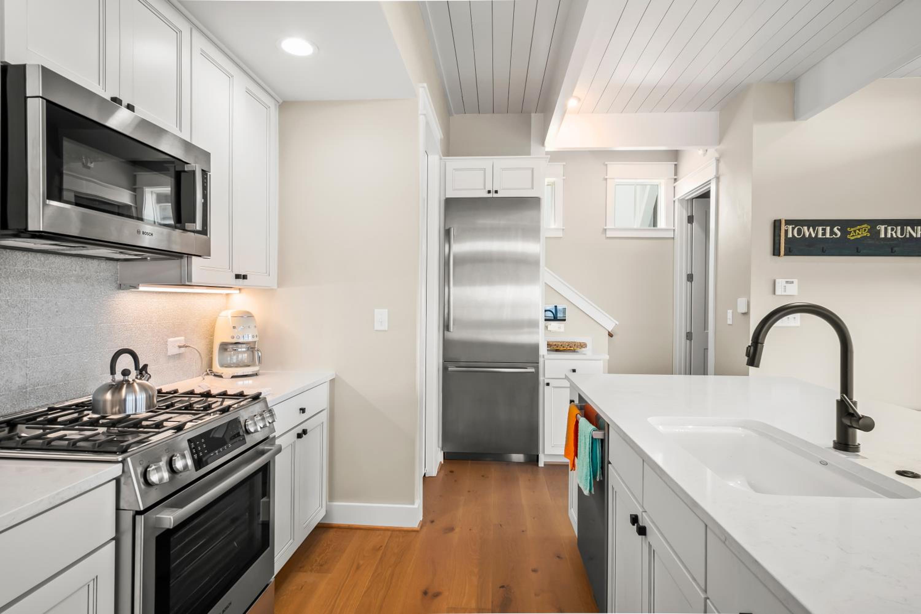 Coastal luxury steps from the shore and resort amenities view 4
