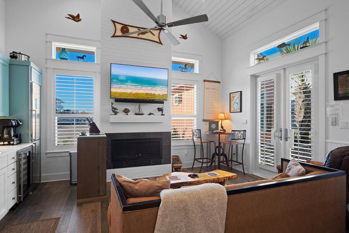 Cozy cabin with community pool and wet bar view 3