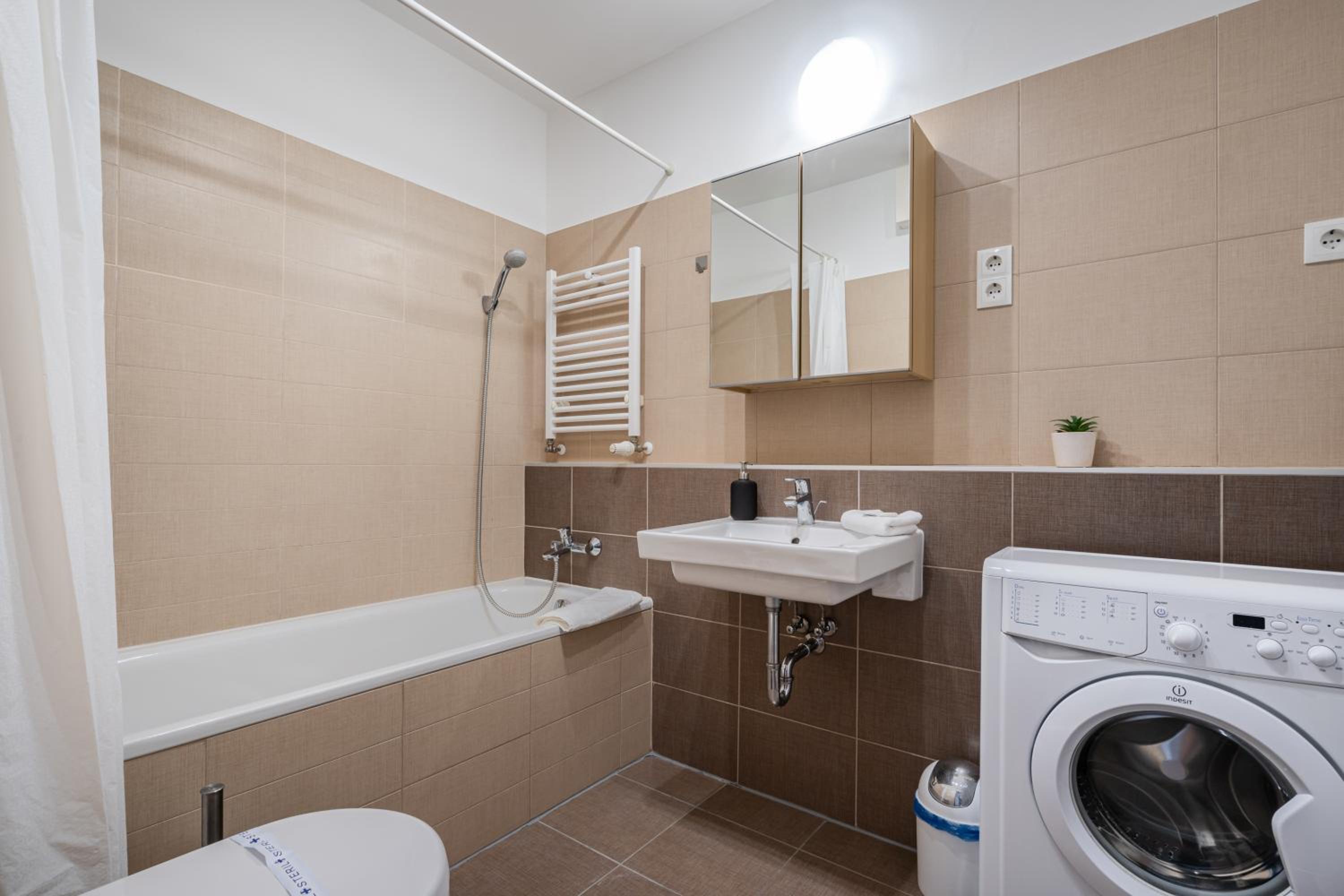 White Cascade Realty Apartment