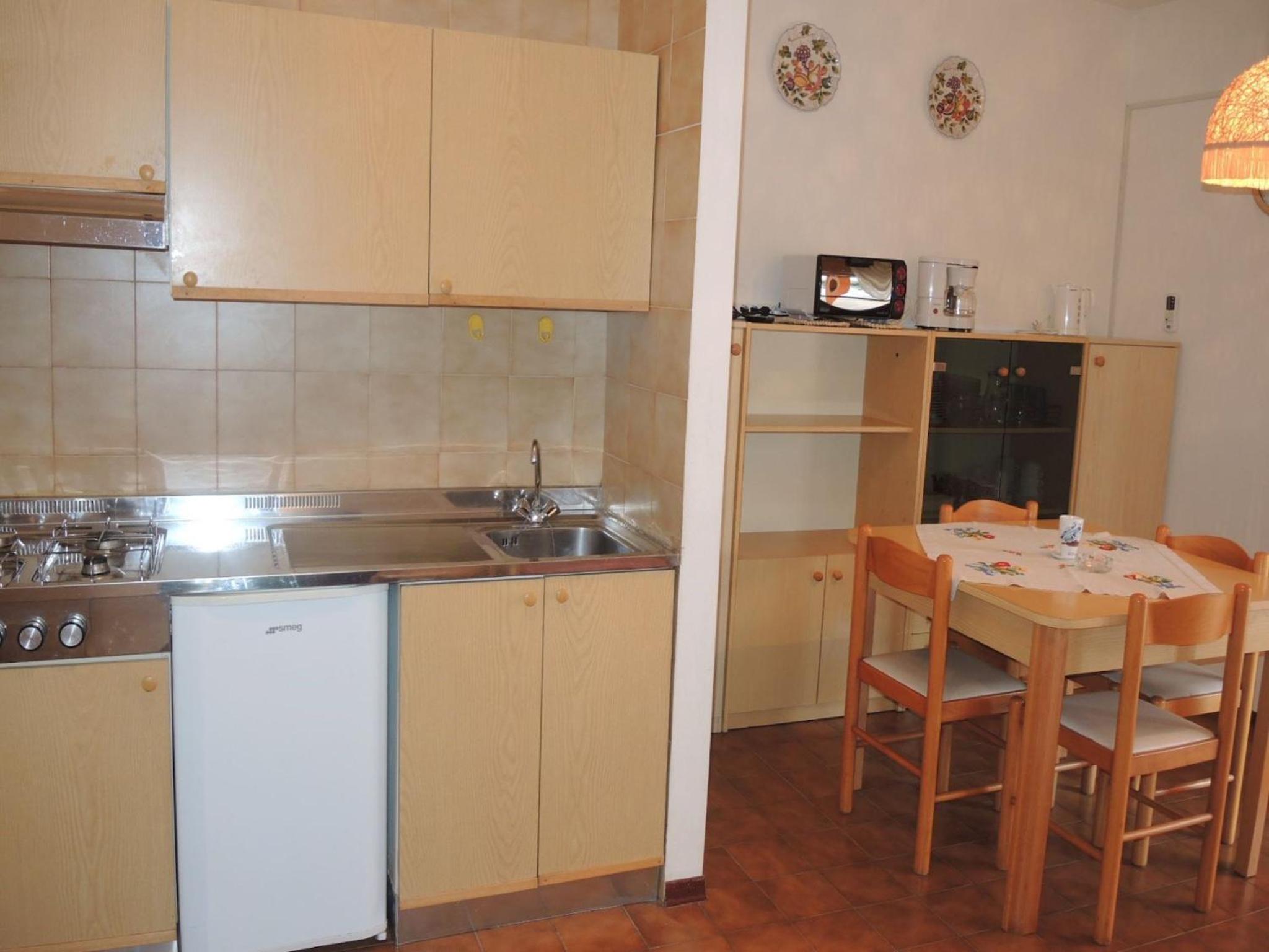 Warm two-room flat with balcony near the beach