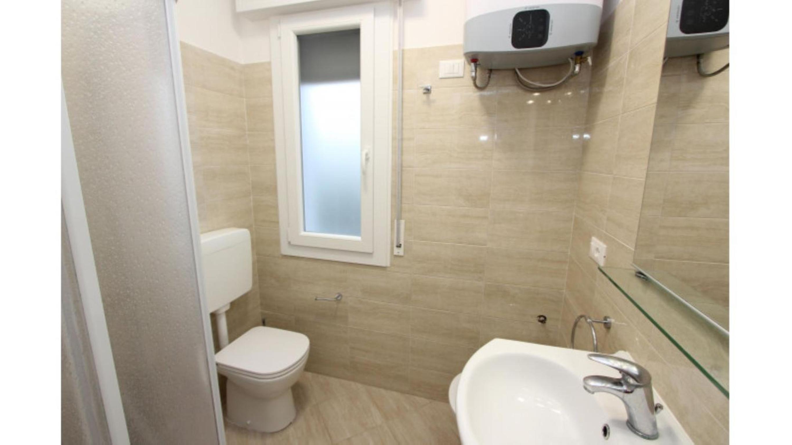 Apartment in a villa with private garden view 2
