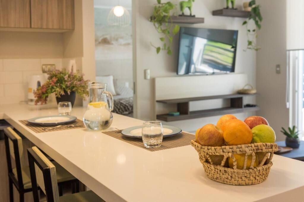 PUCON depto NUEVO! DOS DORMITORIOS DOS BAÑOS, en condominio con estacionamiento,balcon, super equipado, WIFI Y CABLE, PISCINA CON JARDINES, ZONA TRANQUILA 