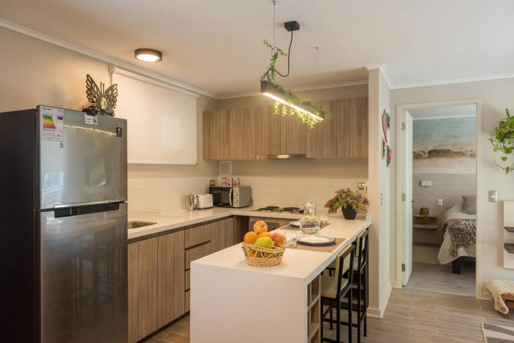 PUCON depto NUEVO! DOS DORMITORIOS DOS BAÑOS, en condominio con estacionamiento,balcon, super equipado, WIFI Y CABLE, PISCINA CON JARDINES, ZONA TRANQUILA 