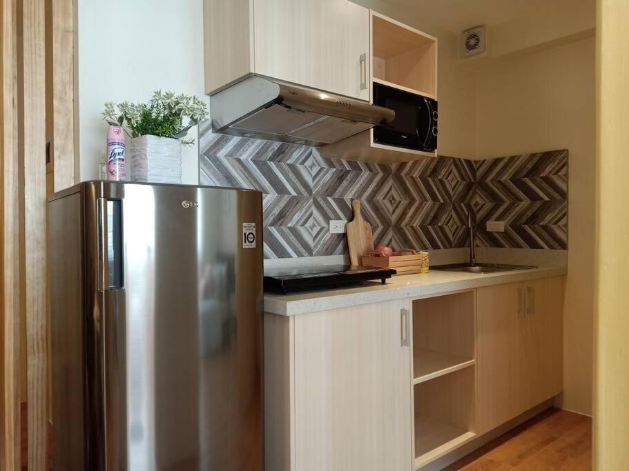 Lovely 2BR Seawind condo with pool view balcony & Fiber Internet view 3