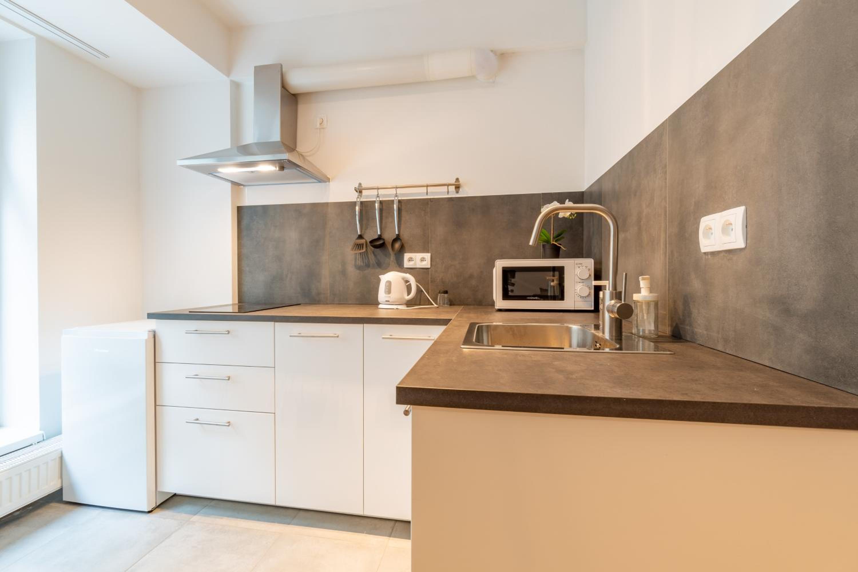 Brand new two room apartment #34 with free secure parking in the center