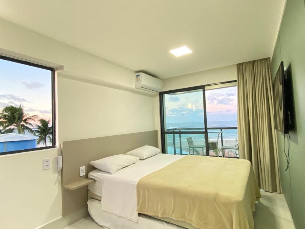 Flat beira mar com varanda em Porto de Galinhas