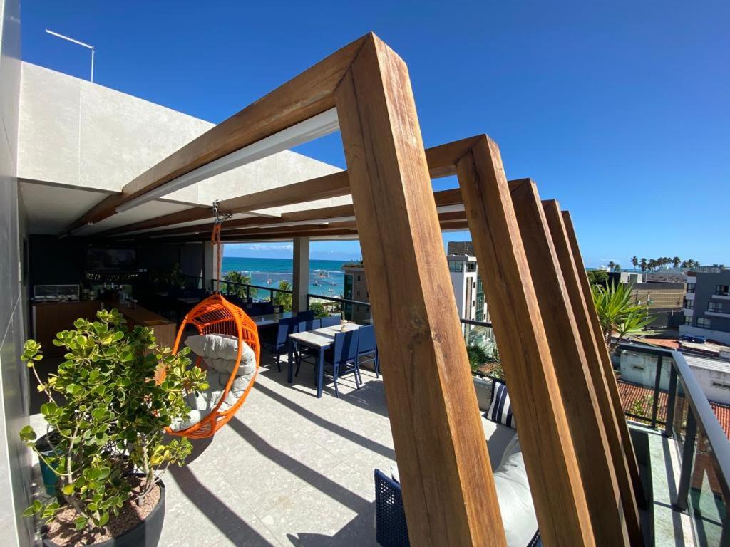 Flat beira mar com varanda em Porto de Galinhas