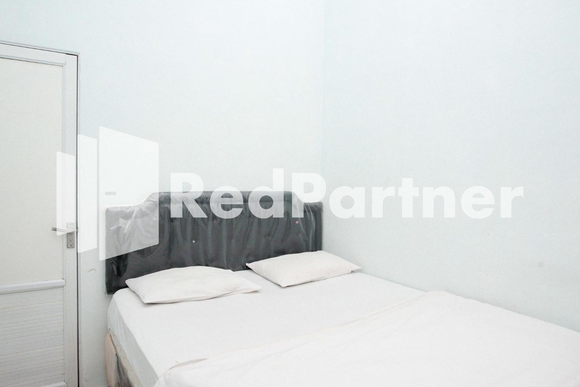 Happy Inn Puspo Mitra RedDoorz, Jomblang - 12