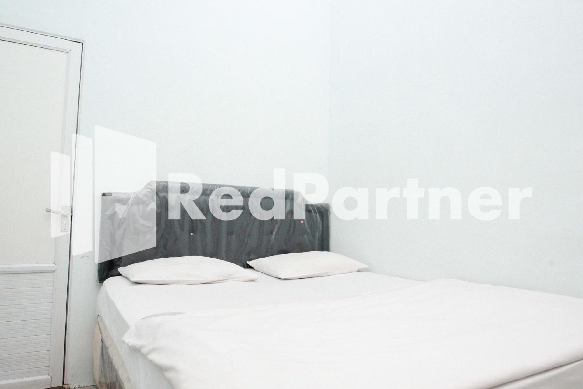 Happy Inn Puspo Mitra RedDoorz, Jomblang - 11