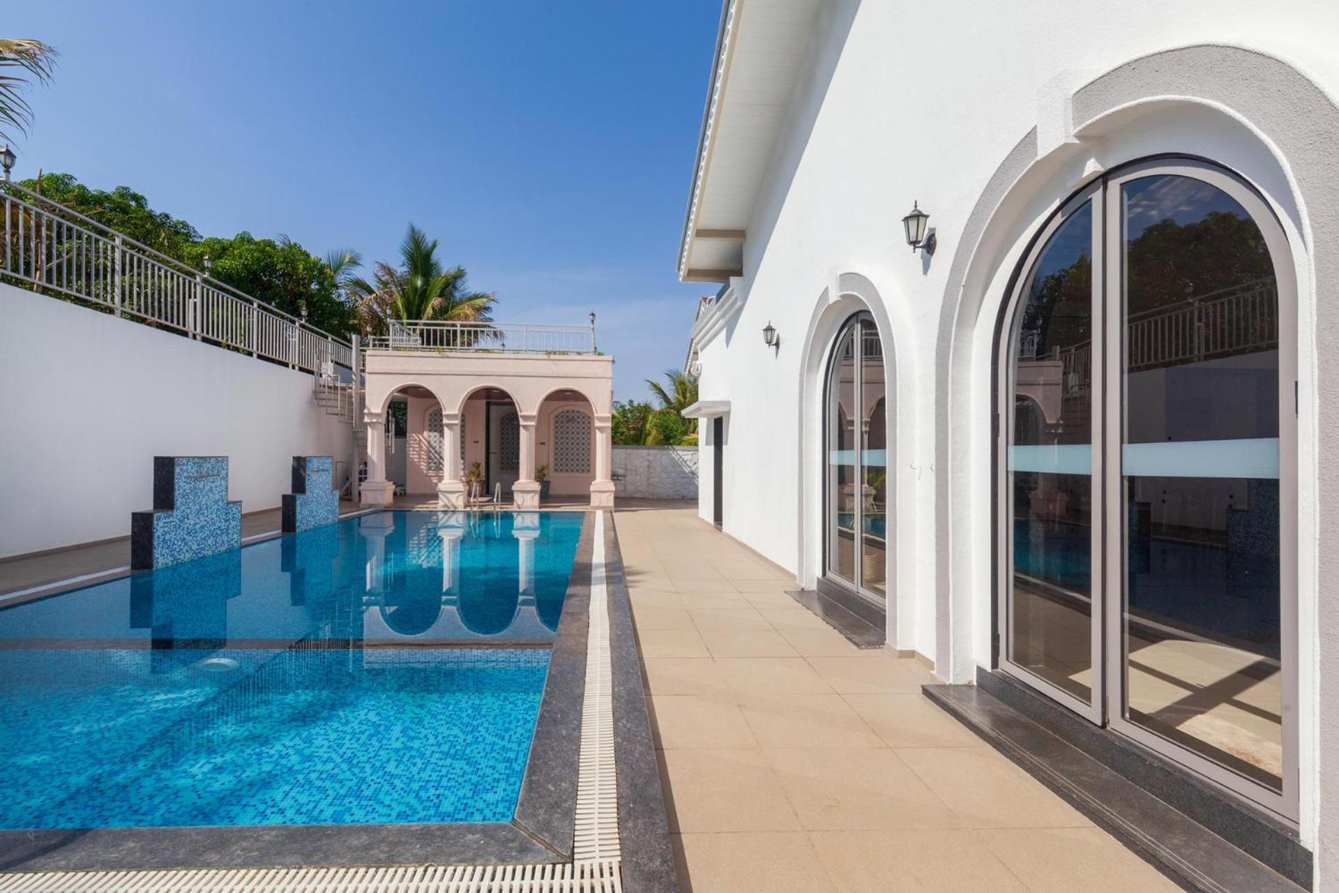 Bellevue Palace by StayVista - Lavish abode with a pool, Landscaped lawn, Gazebo & Adventure activities view 4