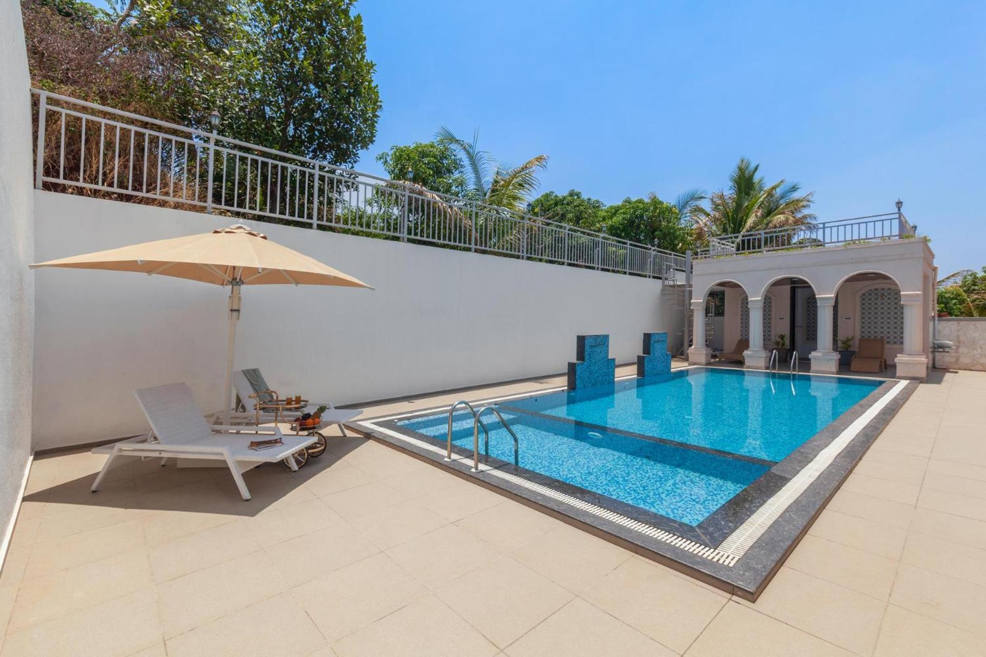 Bellevue Palace by StayVista - Lavish abode with a pool, Landscaped lawn, Gazebo & Adventure activities view 5