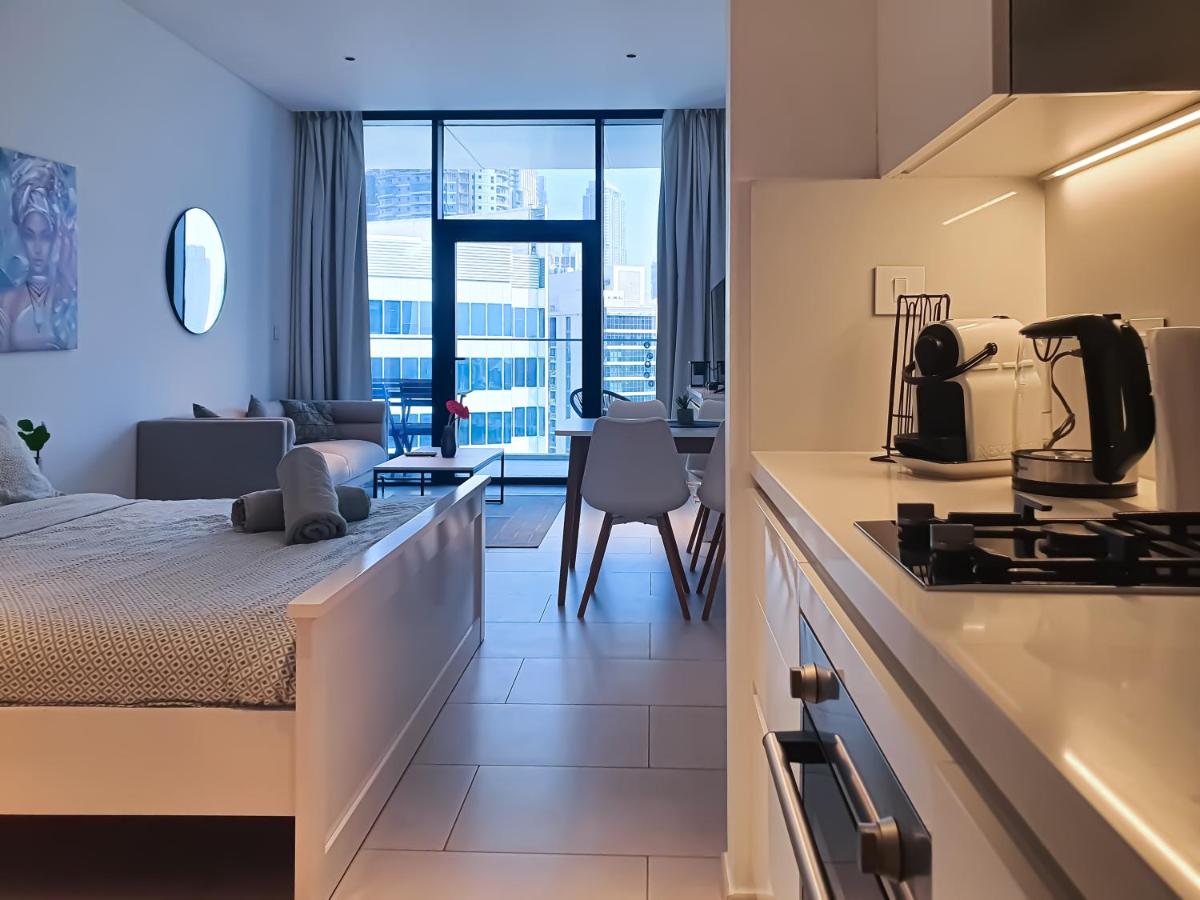 Luxury Studios with Burj Khalifa & Canal View in Downtown - Marquise Square Tower