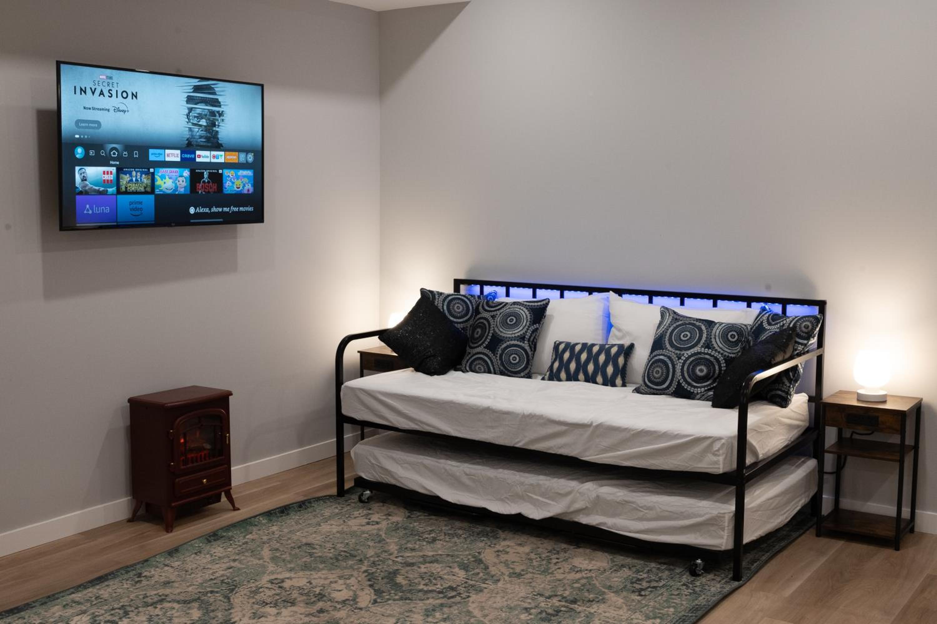 Kid & Pet Friendly Walkout BSMT 90 mins to Banff and 30 mins to Downtown Calgary