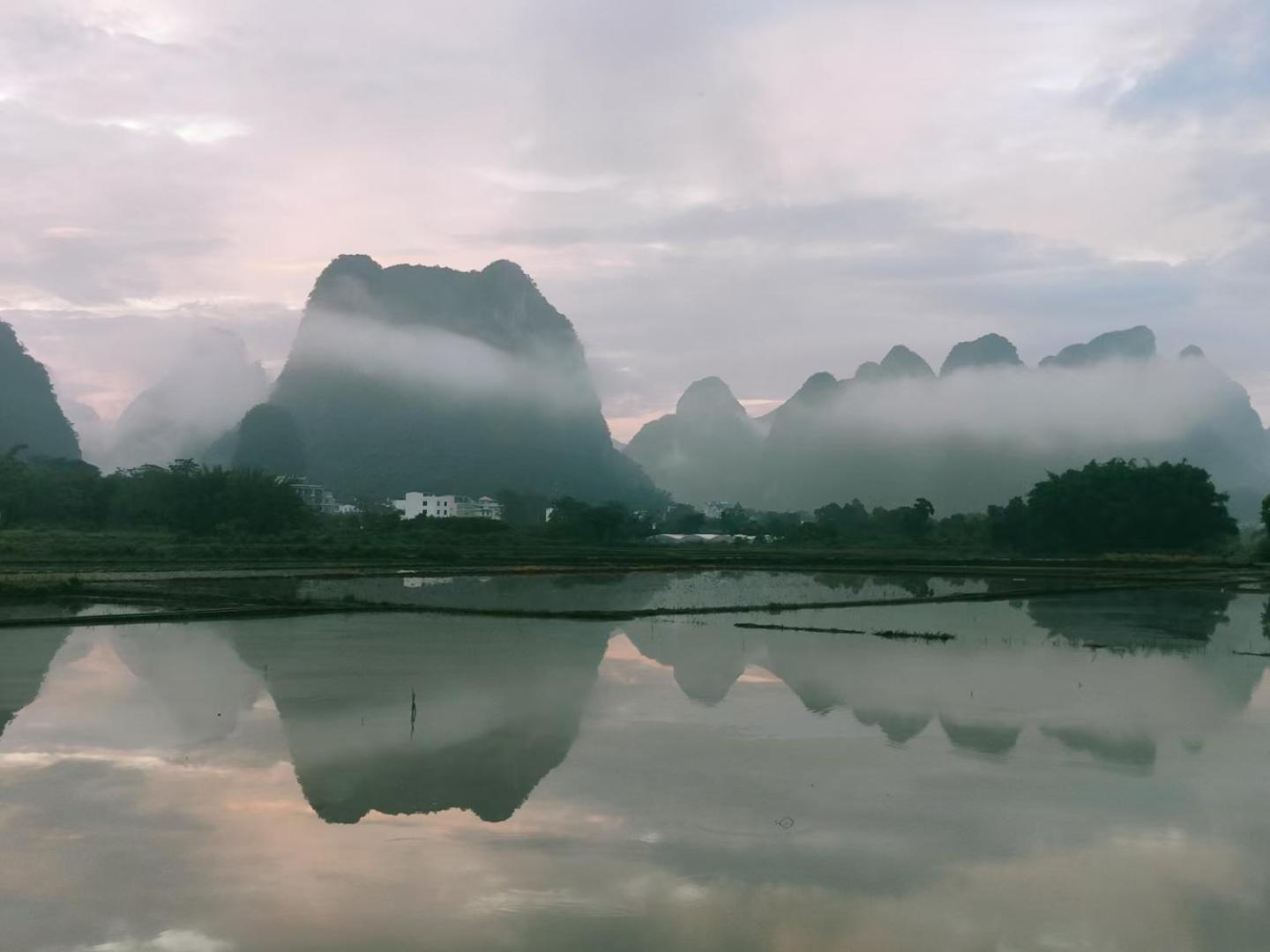 Yangshuo Eden's Social Guesthouse - Wake up to a hearty Western breakfast & fresh craft coffee & night beers & outdoor activities