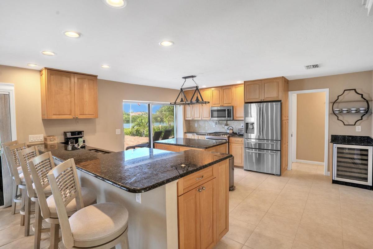 Paradise with a pool, pier and private beach area view 5