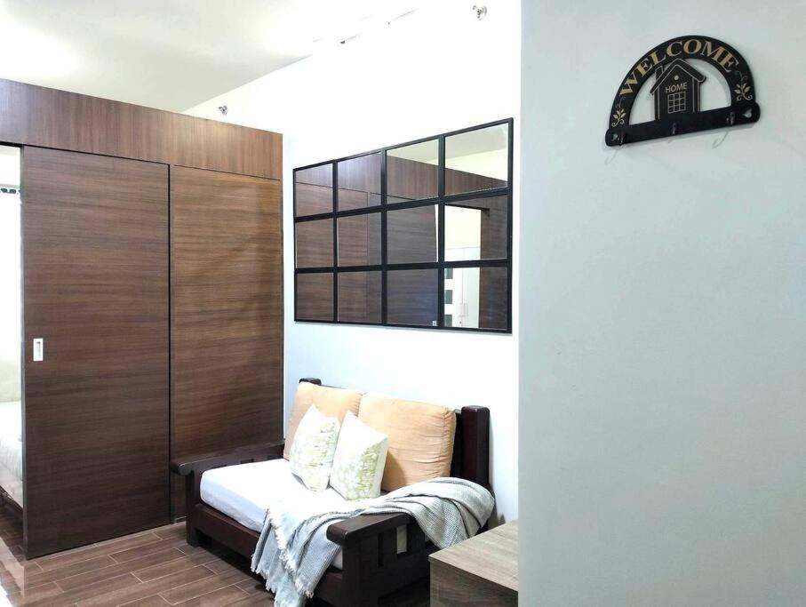 New Makati 1BR Resort View above AIR Mall 50-inch SMART TV view 3