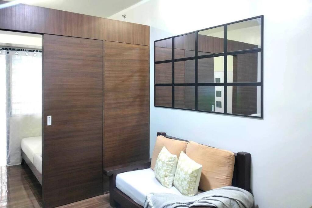 New Makati 1BR Resort View above AIR Mall 50-inch SMART TV view 4