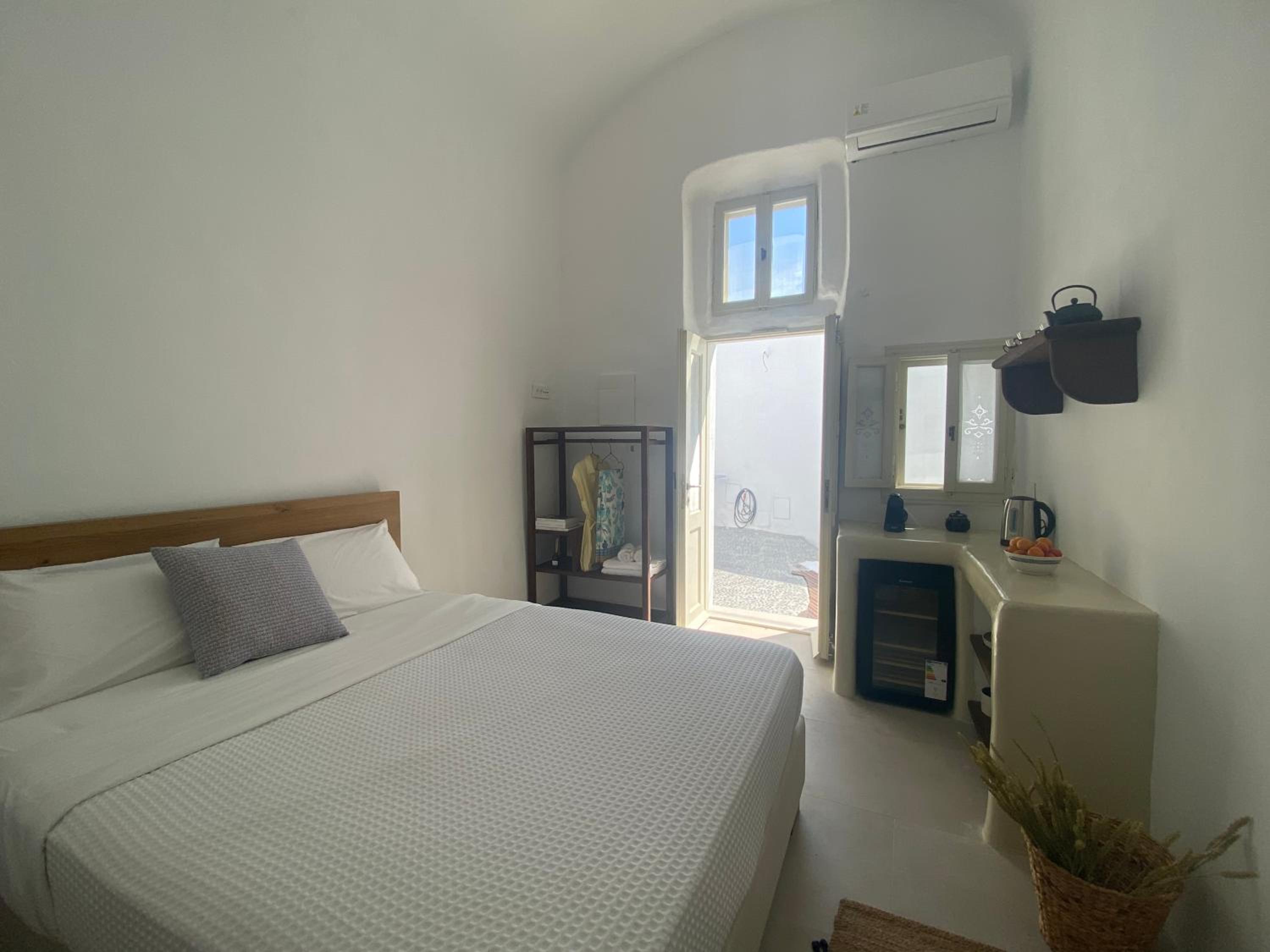 Villa Patitiri cave house with private pool in Megalochori Santorini view 4