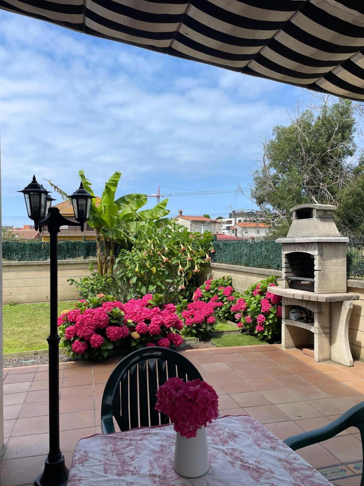 apartamento con jardín privado y barbacoa a 5 min playas santander photo 1