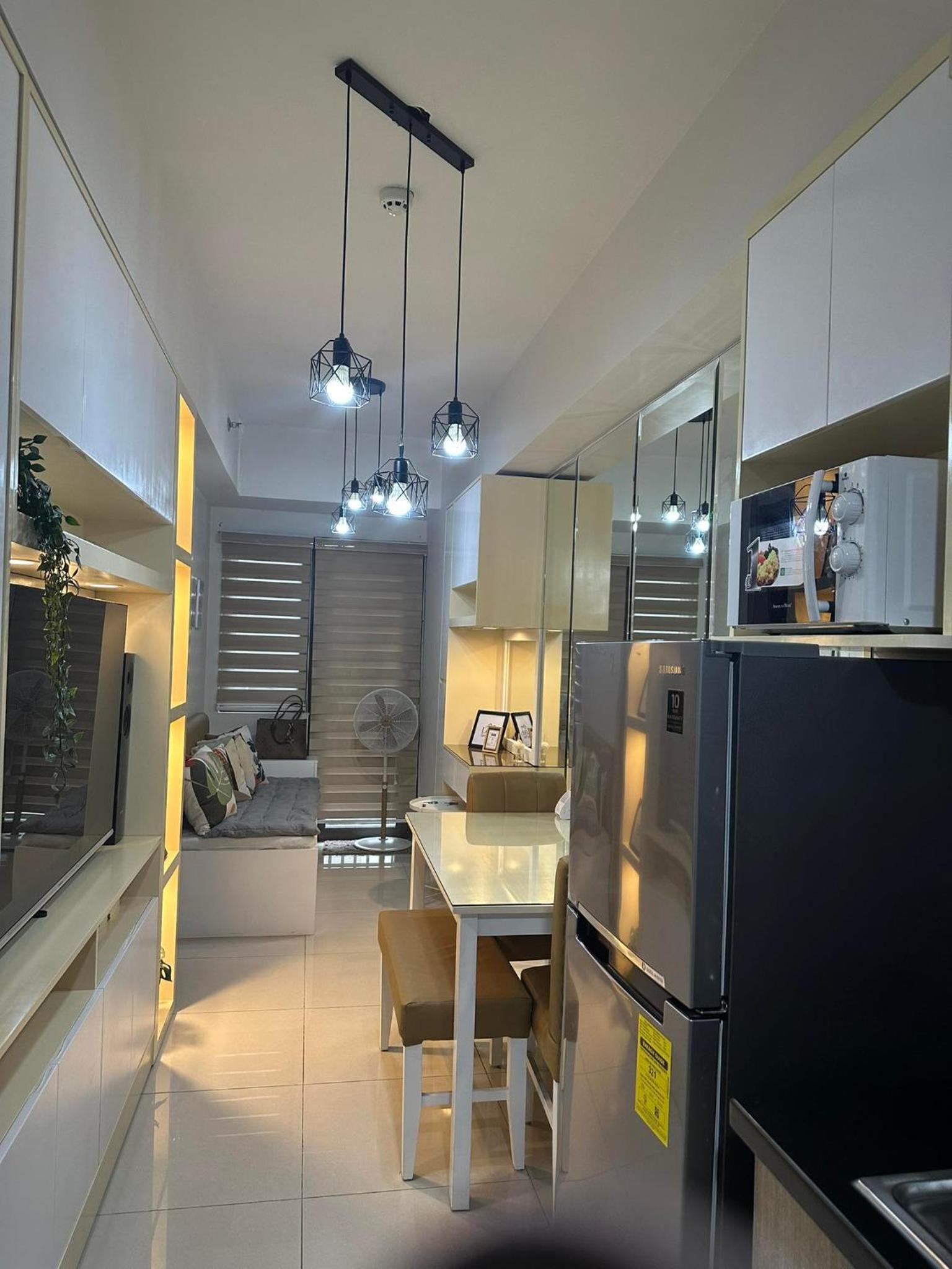Mel and Rose Place in S Residences Tower 1 MOA view 2