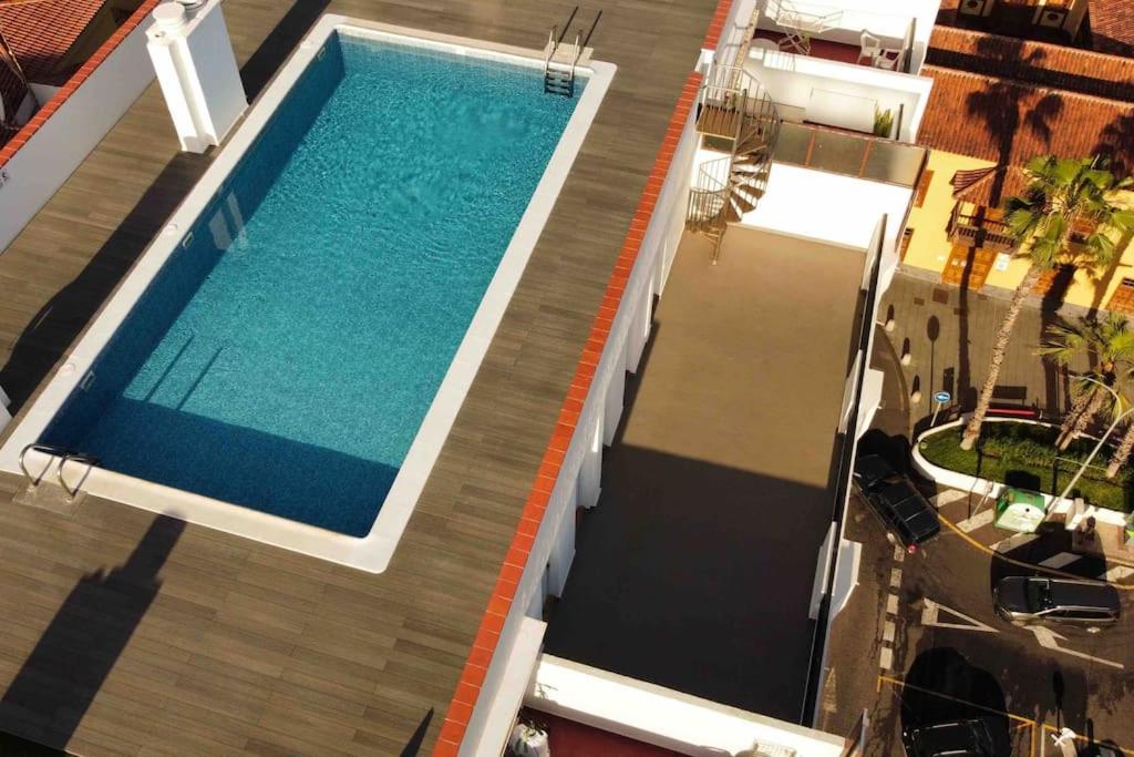 Estudio Ático Sol y Playa piscina