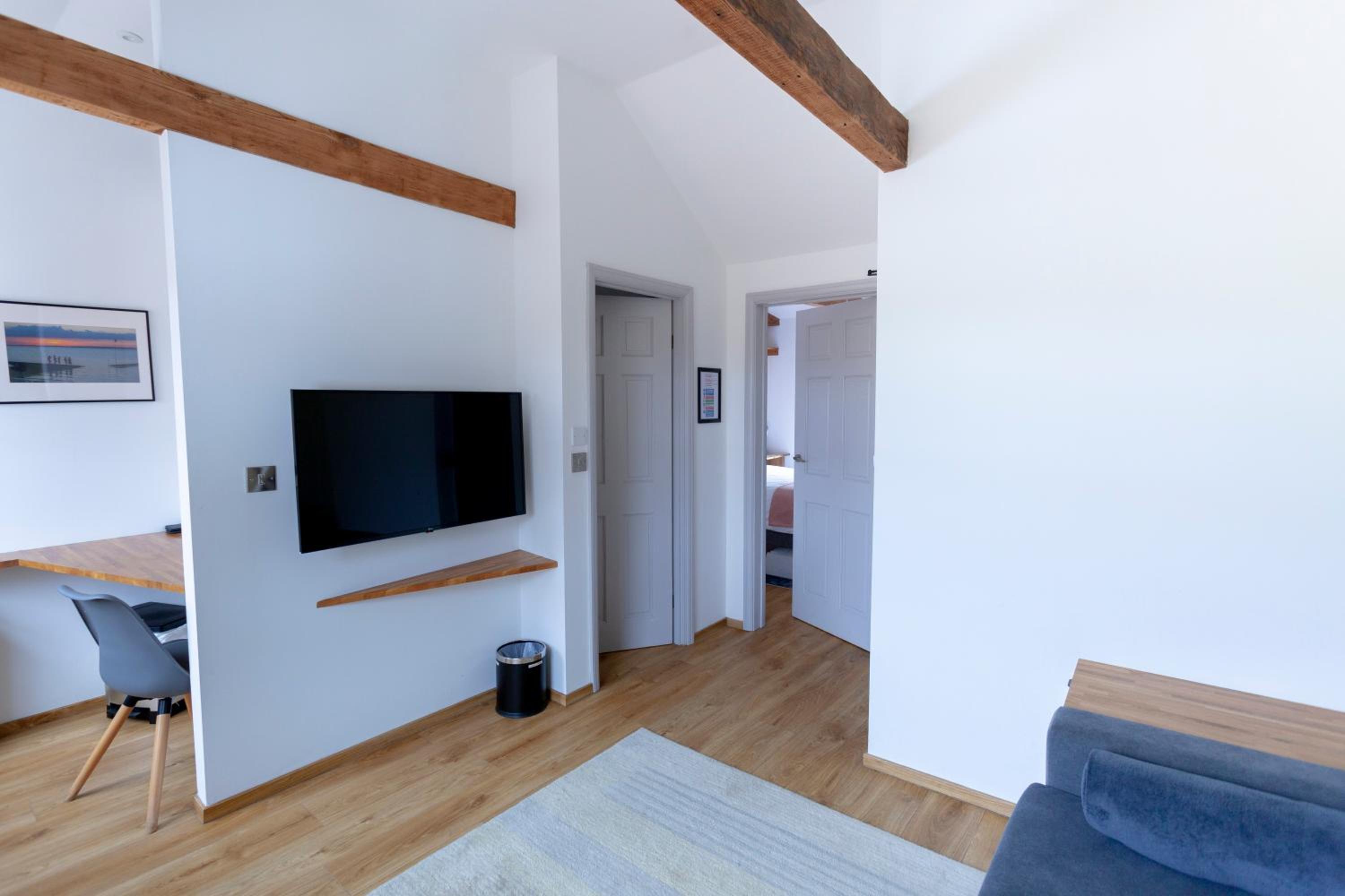 Apartment 5 at Number 8: 1 bedroom, sofa bed in lounge, kitchenette & walk-in shower view 4