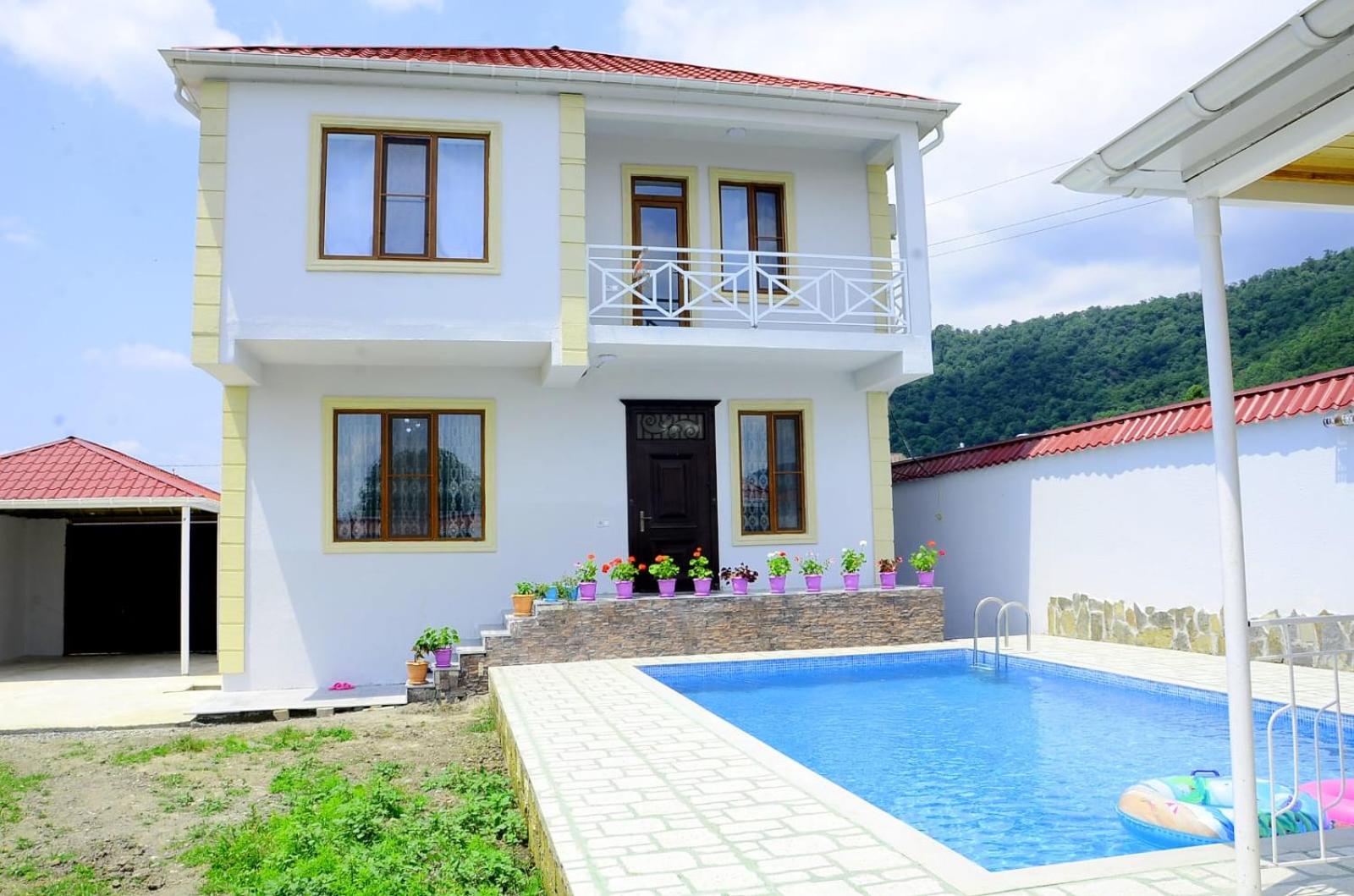 White villa with pool