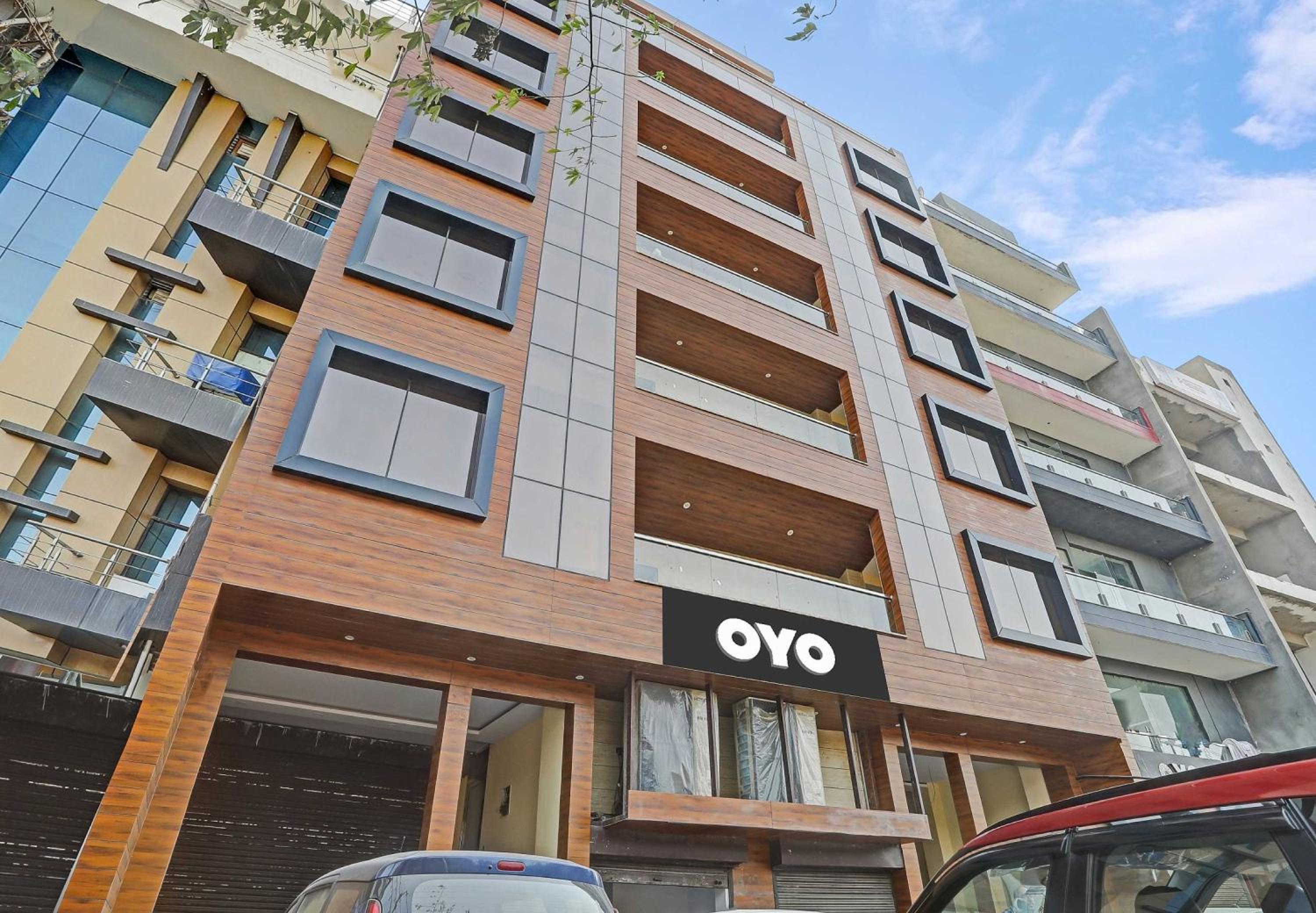 Capital O Mt Corporate Stays Near Iskcon Temple Noida view 2