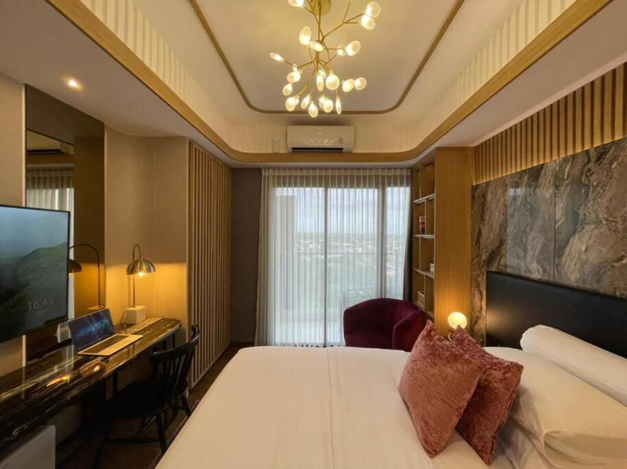 Lovely Studio Apartment at Amarta Apartment by Kinasih Suites view 3