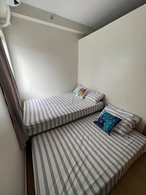 2BR SMDC Trees w/Netflix&WIFI near the POOL. T65F view 4