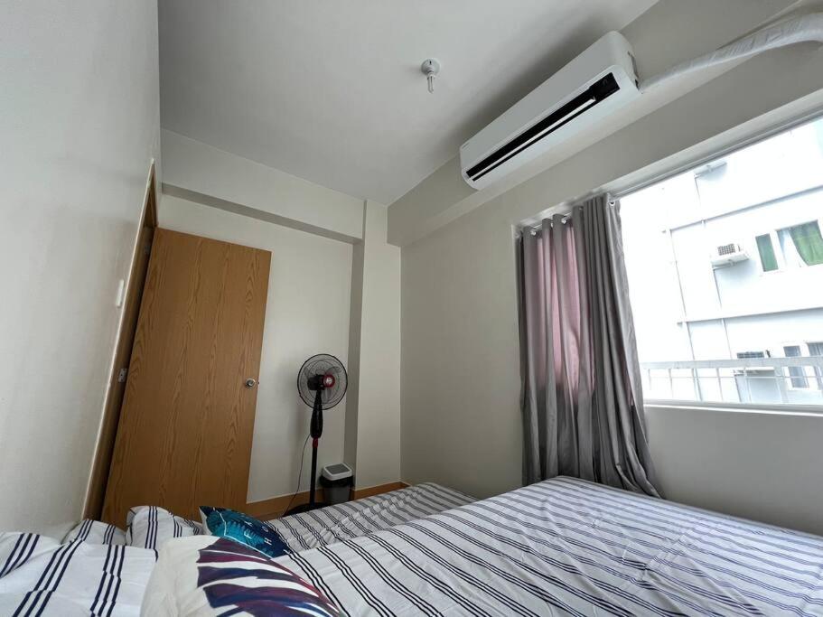 2BR SMDC Trees w/Netflix&WIFI near the POOL. T65F view 5