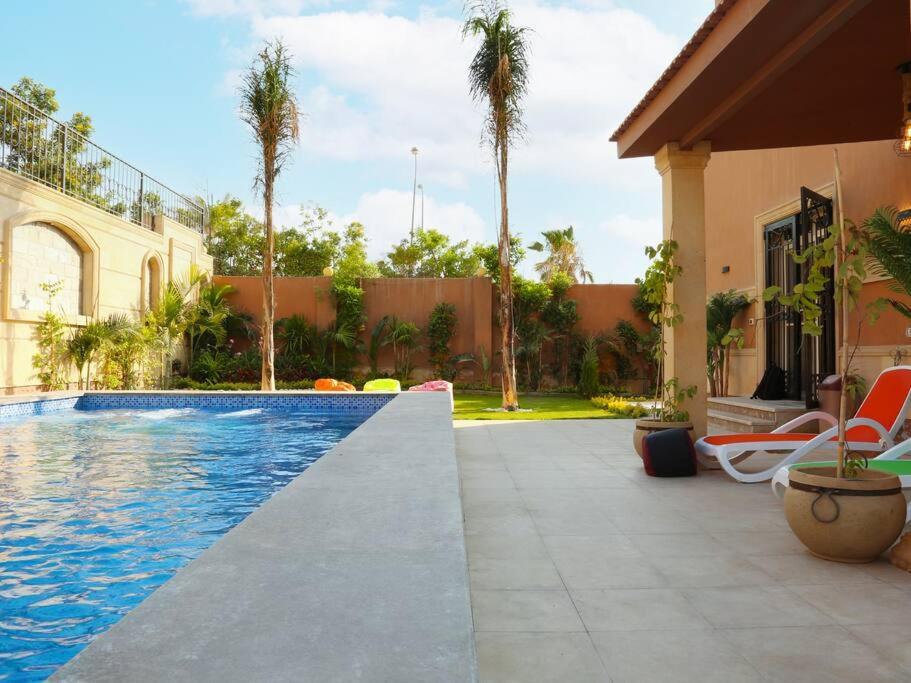 Royal Mansion with private pool in sheikh zayed Compound families